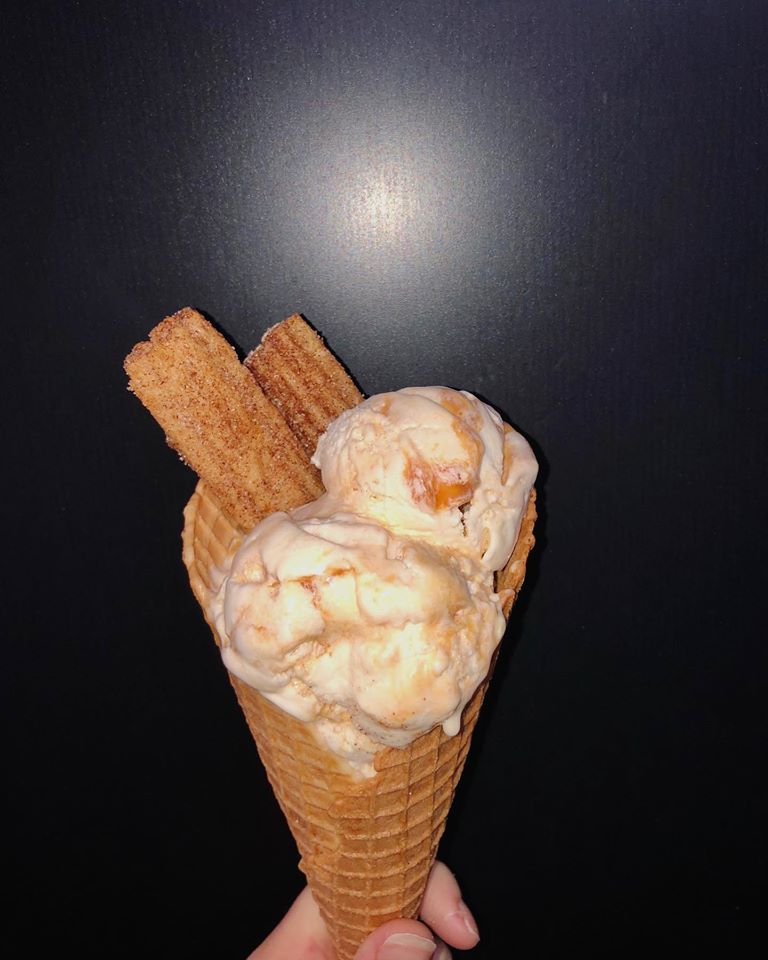 Churros in ice cream from Udder Delights in a cone.