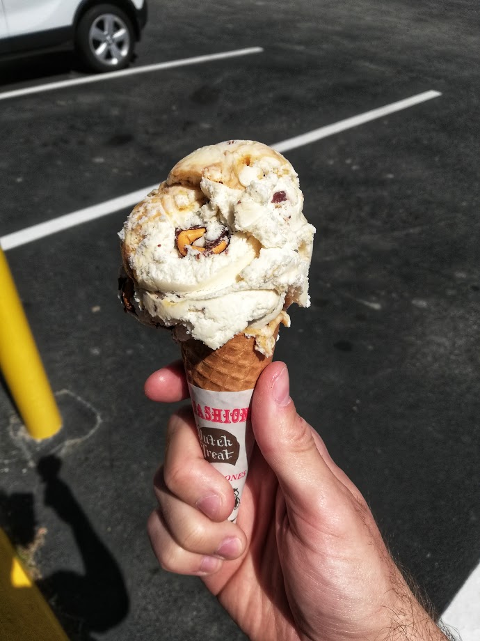 Pretzel ice cream in a sugar cone from countryside creamery.
