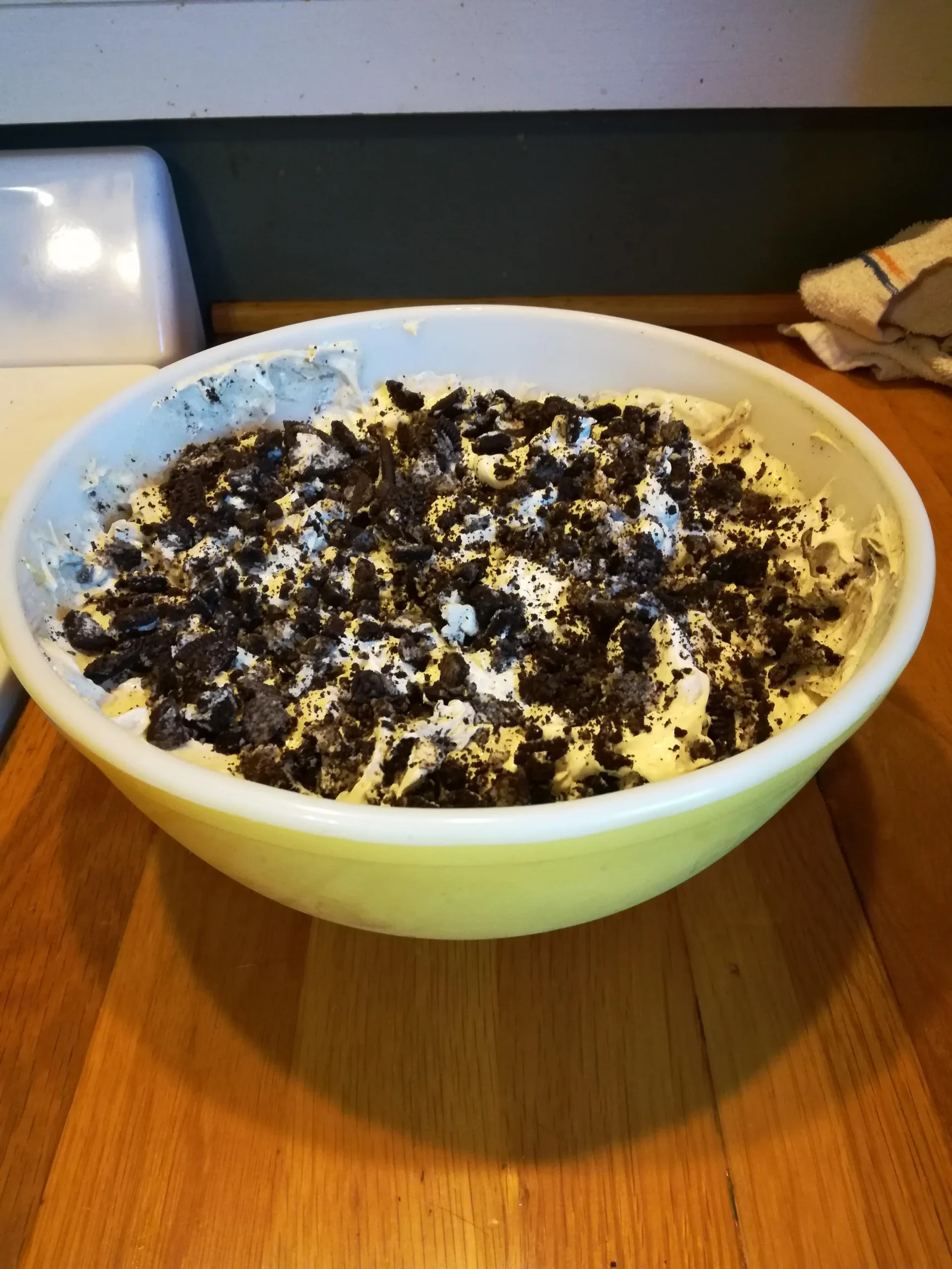 A large bowl of Oreo Fluff on a counter top.