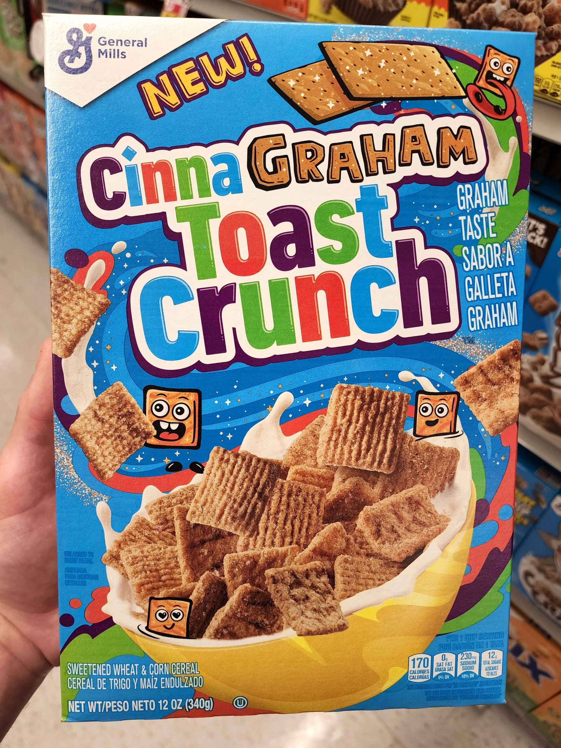 Front of CinnaGraham Toast Crunch cereal box.