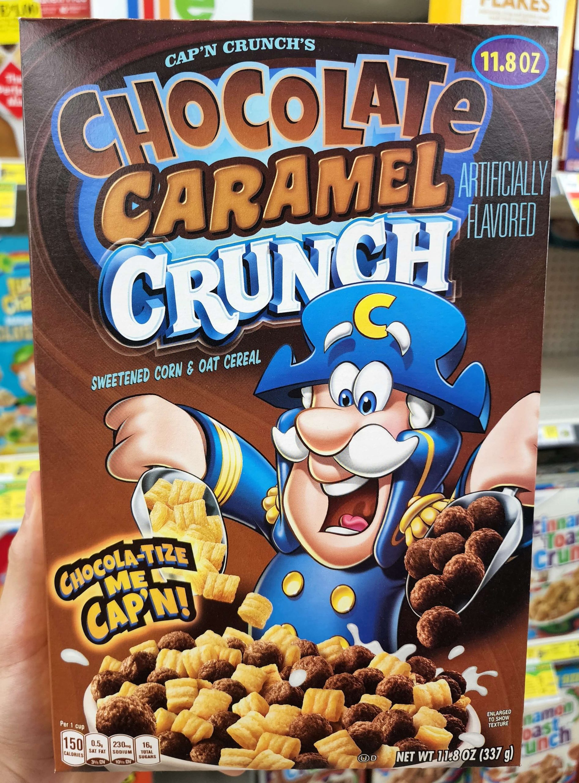 Front of Cap'n Crunch's Chocolate Caramel Crunch cereal box.