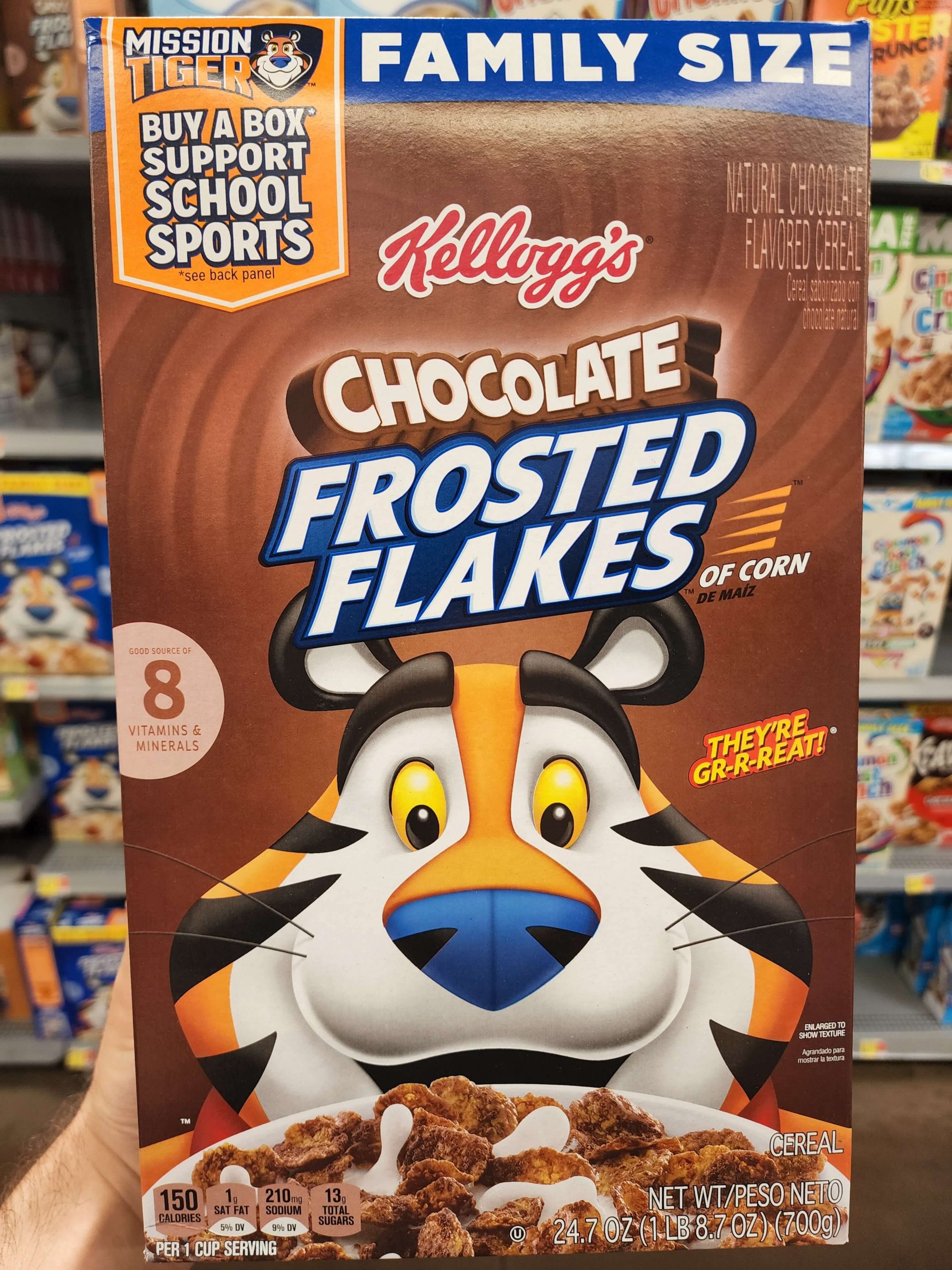 Front of Kellogg's Chocolate Frosted Flakes cereal box.