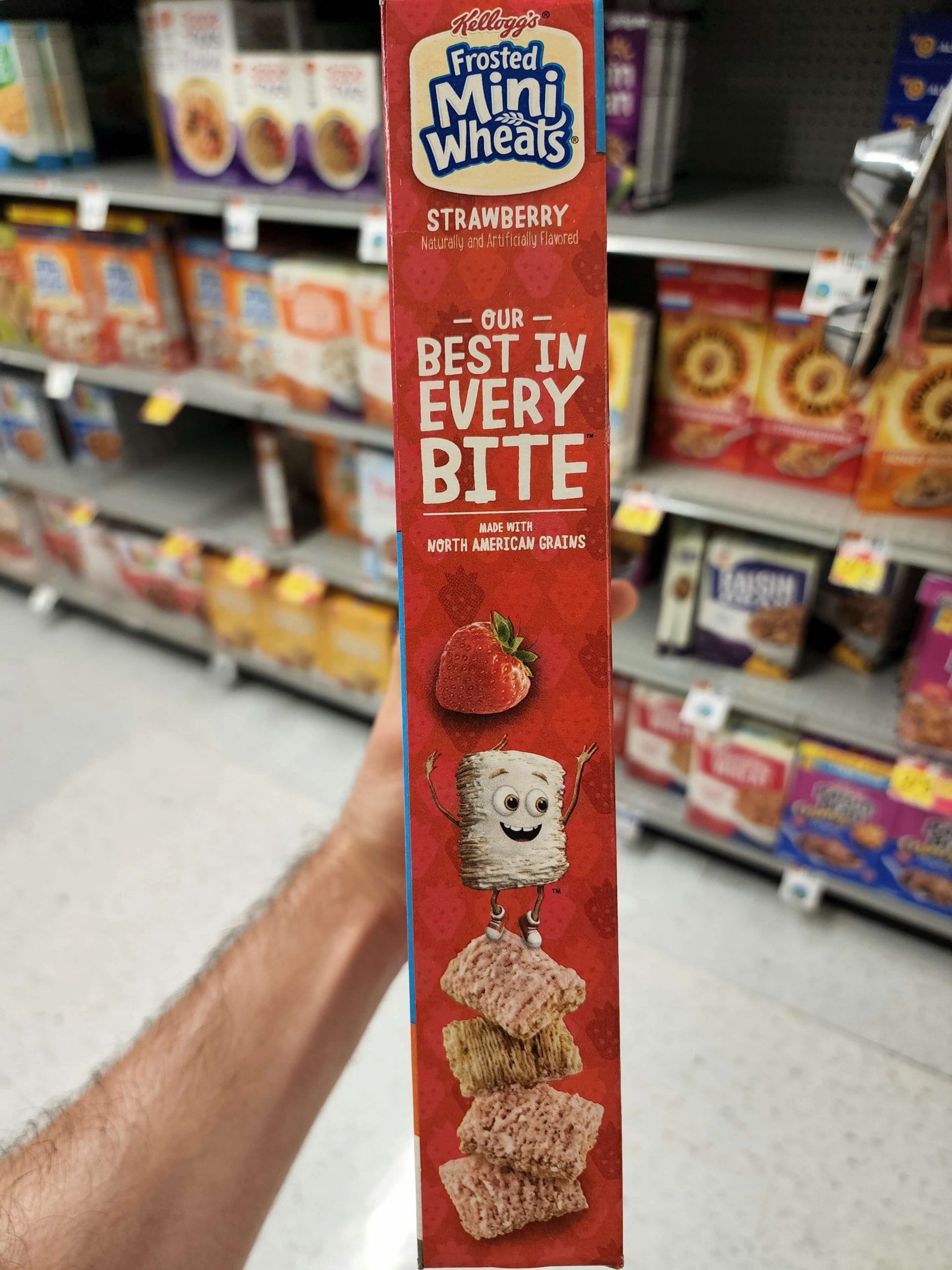Side of Kellogg's Strawberry Frosted Mini Wheats 2022 cereal box.