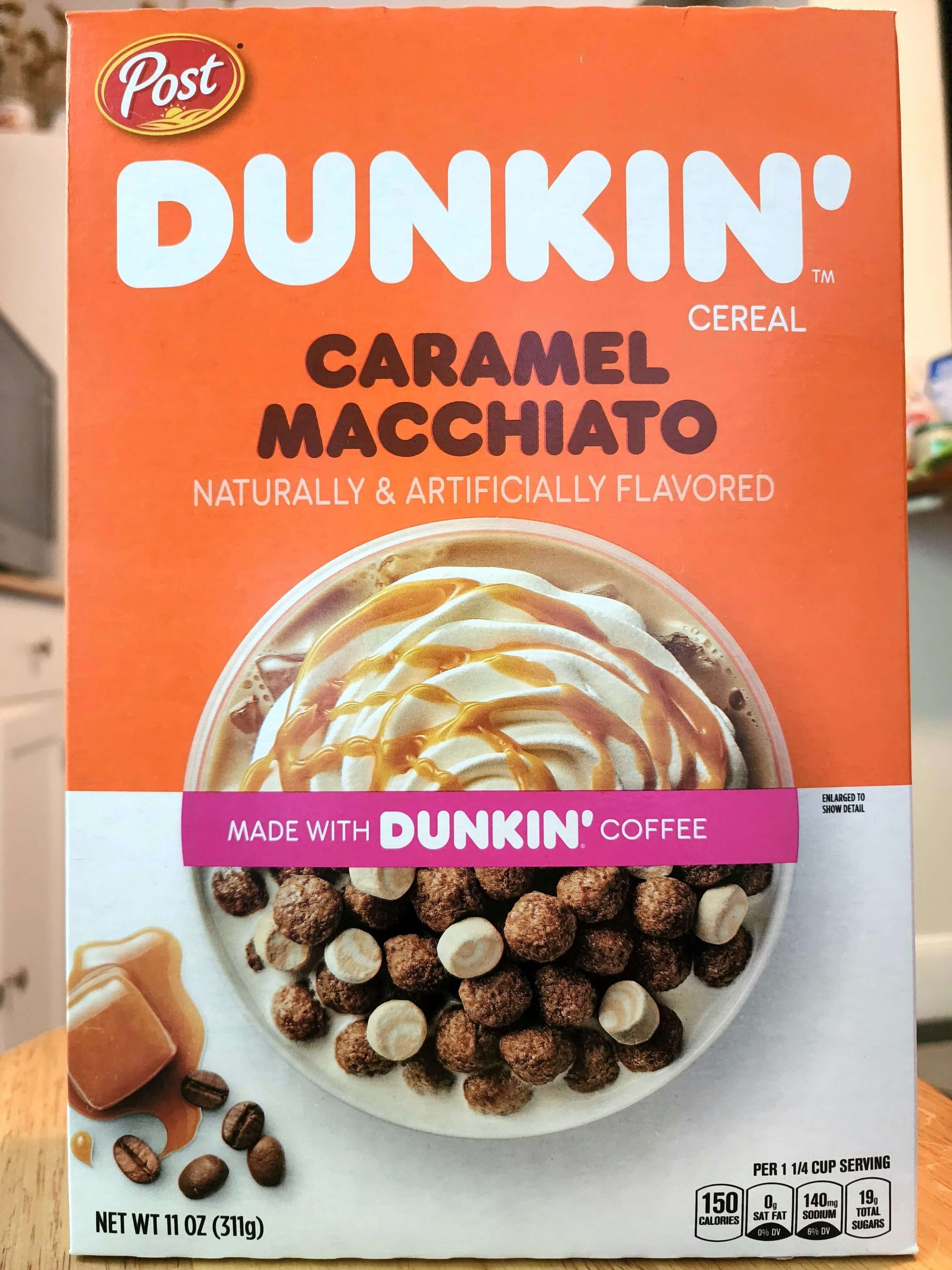 Front of Post Dunkin' Caramel Macchiato cereal box.