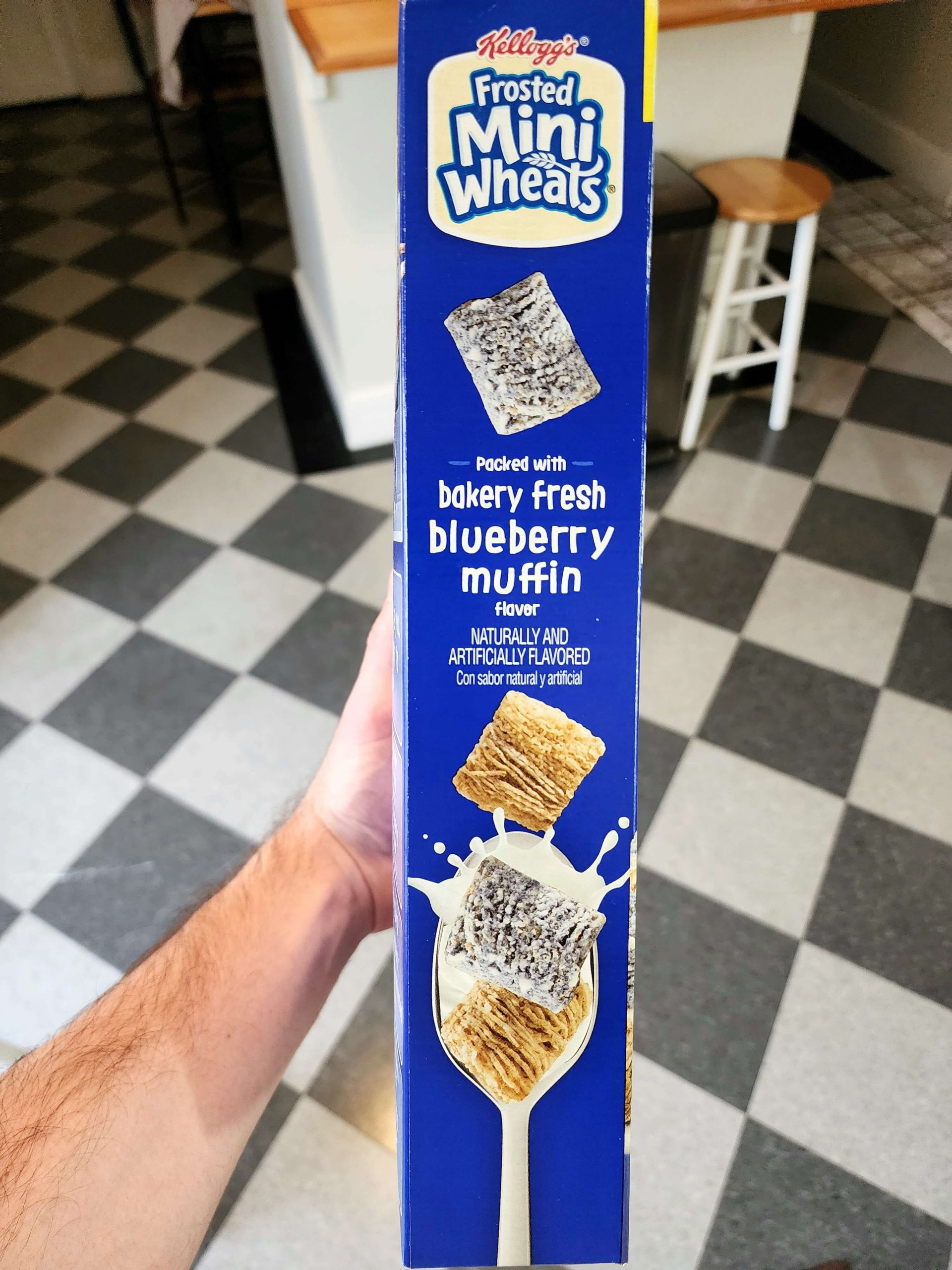 Side of Kellogg's Blueberry Frosted Mini Wheats 2022 cereal box.