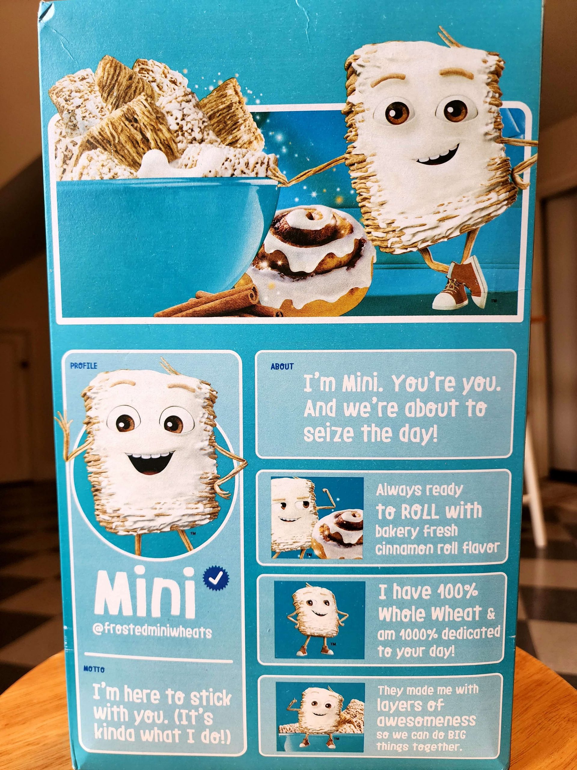 Back of Kellogg's Cinnamon Roll Frosted Mini Wheats 2022 cereal box.