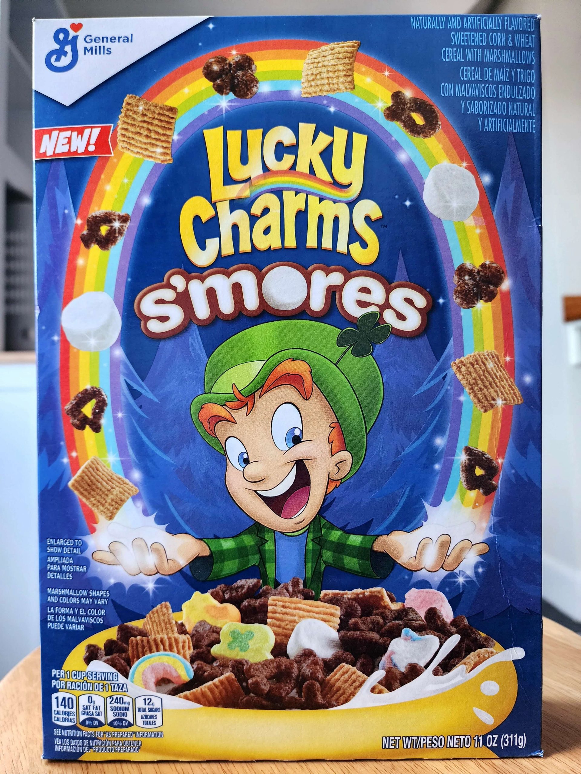 Front of General Mills Lucky Charms S'mores cereal box.