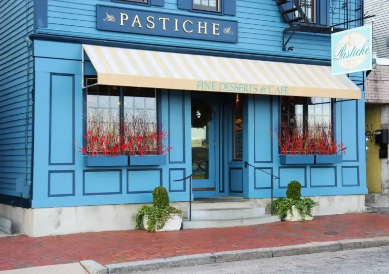 An outside picture of a blue wooded store front. Depicts Rhode Island bakery called Pastiche.