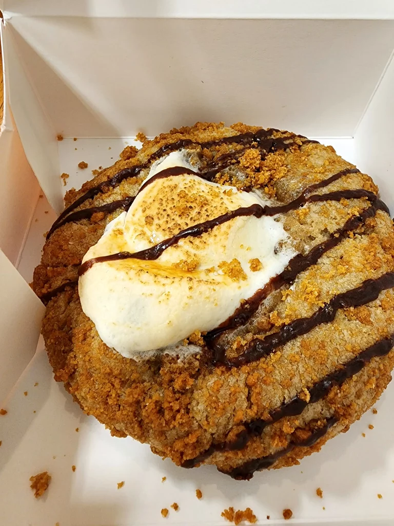 Large s'mores Crumbl Cookie in a white box.