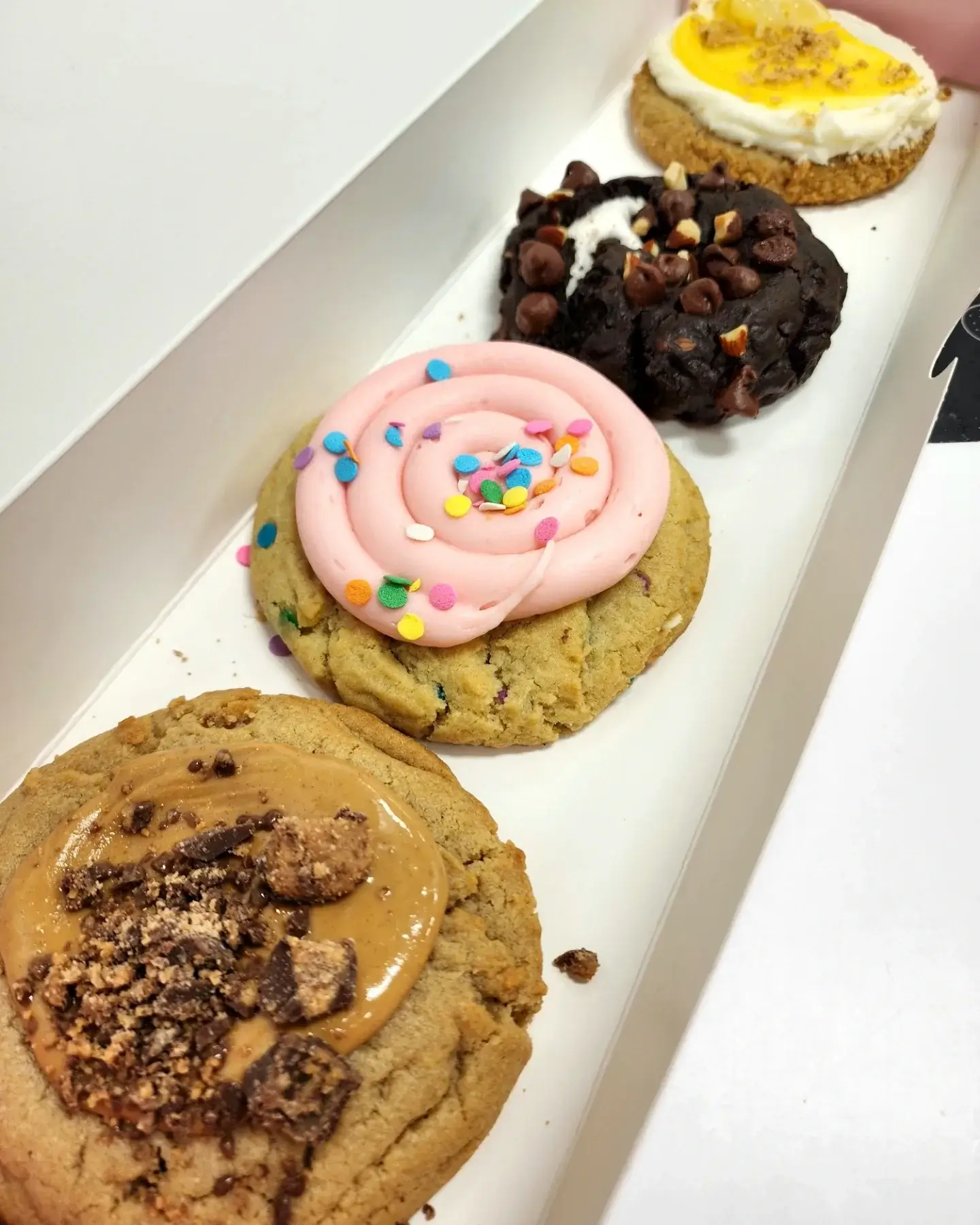 Crumbl Cookie Review Confetti Cake, Peanut Butter Cup ft. Reese's