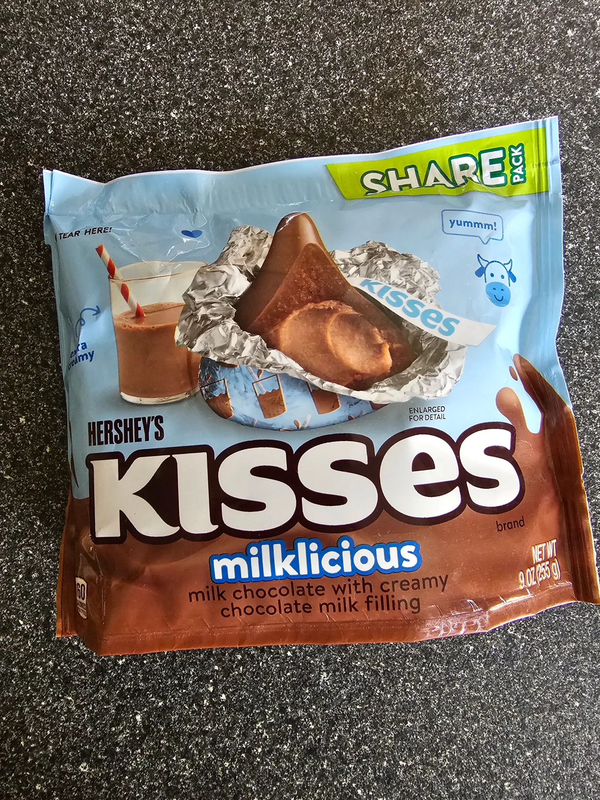 Front package of Share size Hershey's Milklicious Kisses.