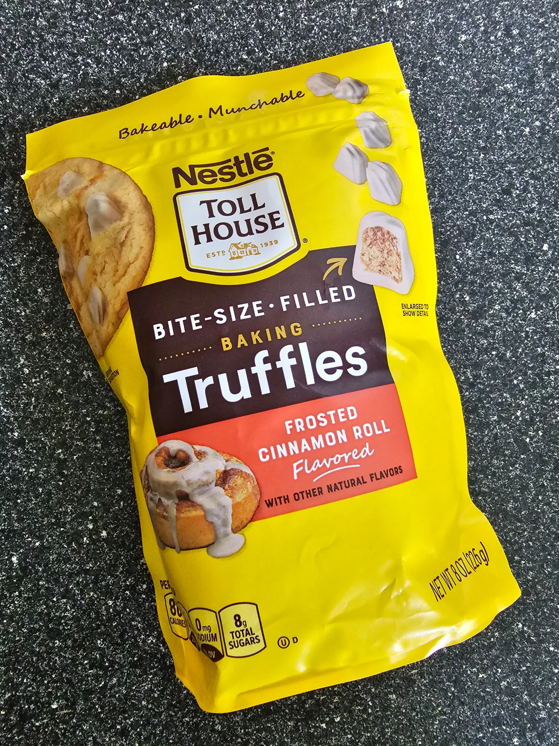 Front package of Nestle Toll House Bite Size Filled Baking Frosted Cinnamon Roll Truffles.
