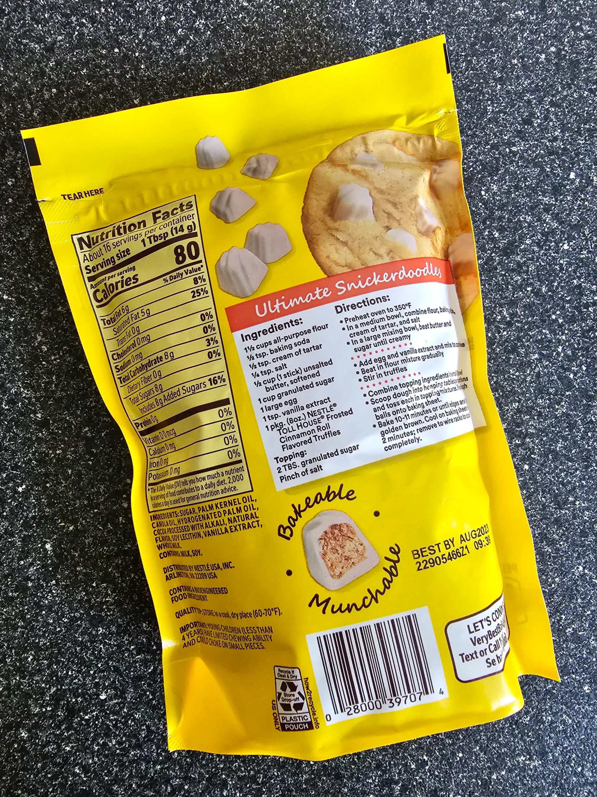 Back package, ingredients, and nutrition label of Nestle Toll House Bite Size Filled Baking Frosted Cinnamon Roll Truffles.