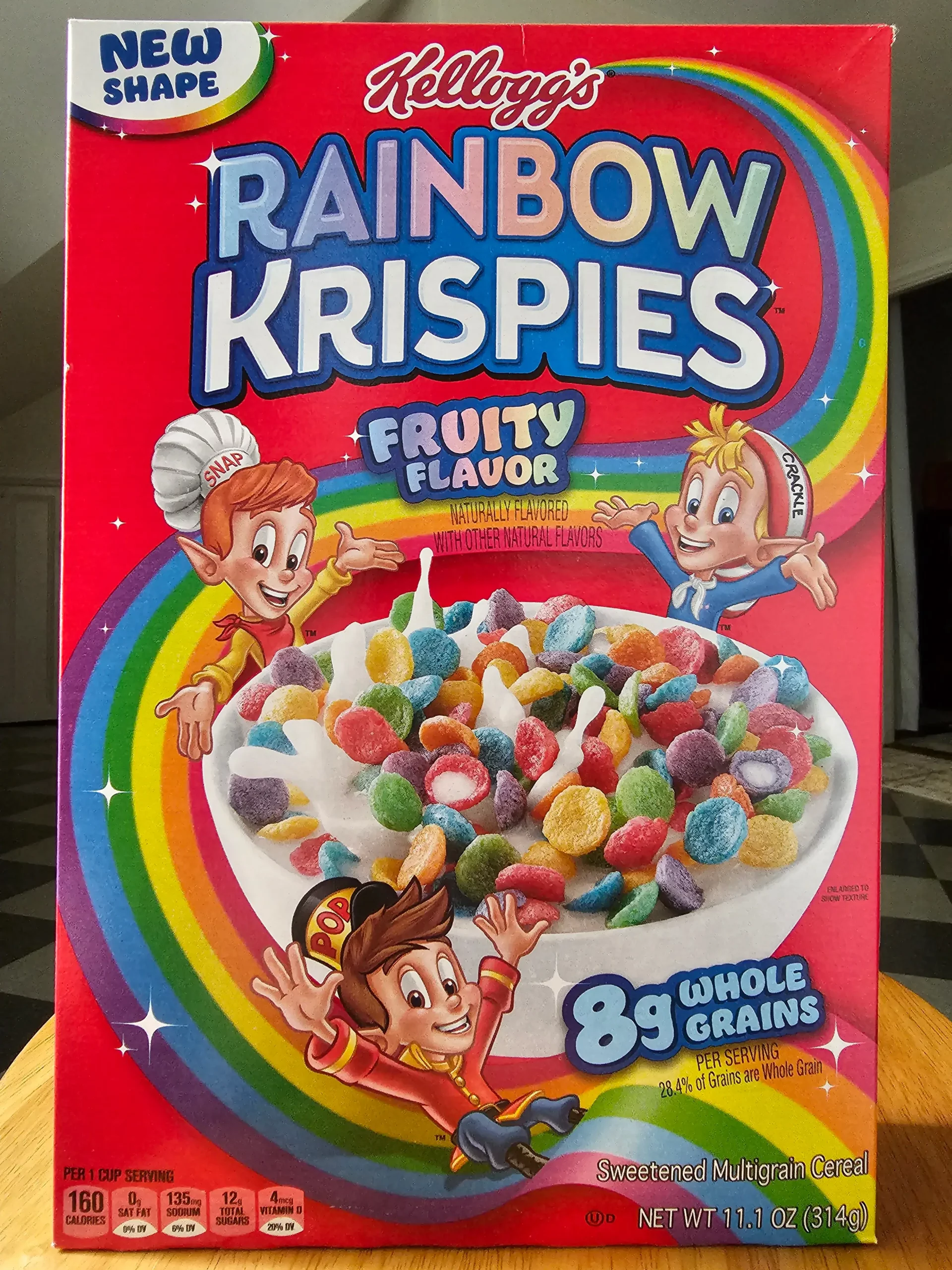 Front package of Kellogg's Rainbow Krispies cereal box.