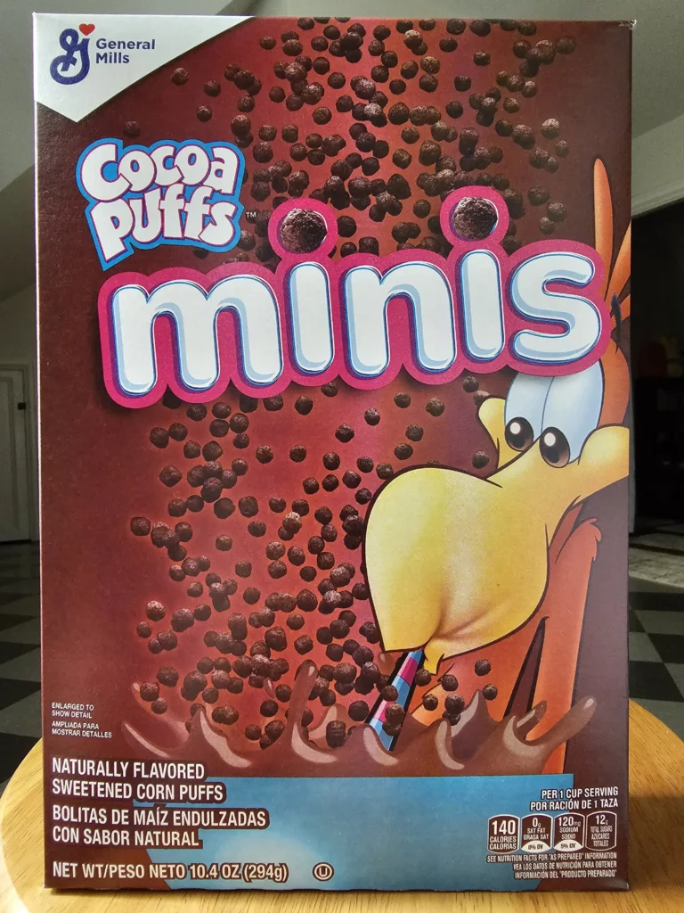 Front package of Post Cocoa Puffs Minis cereal box.