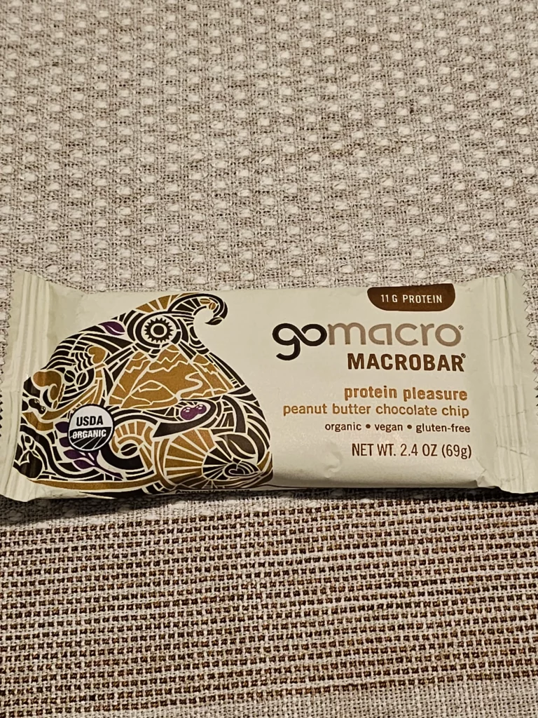 Wrapped bar of GoMacro macrobar, peanut butter and chocolate chip.
