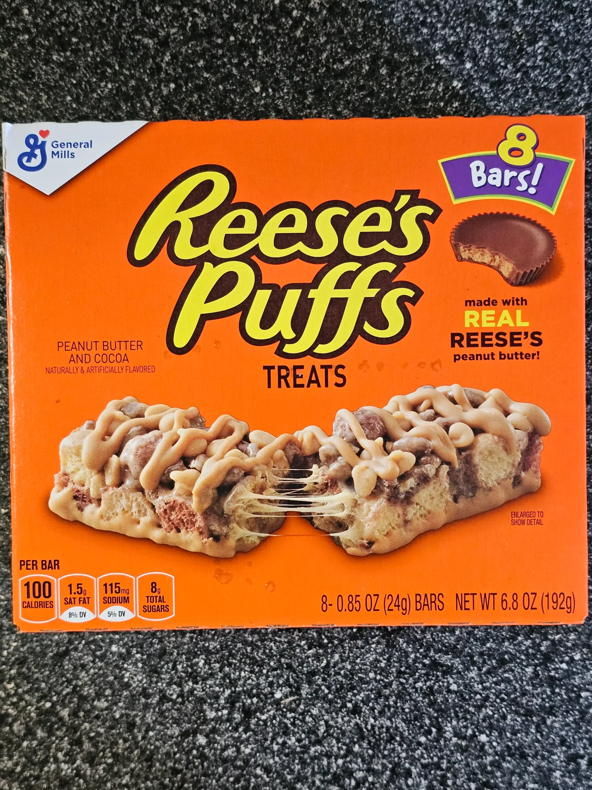 Front box of General Mills Reese's Puffs Treats cereal bars.