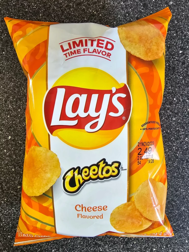 Front package of limited edition Lays Cheetos flavored Chips.