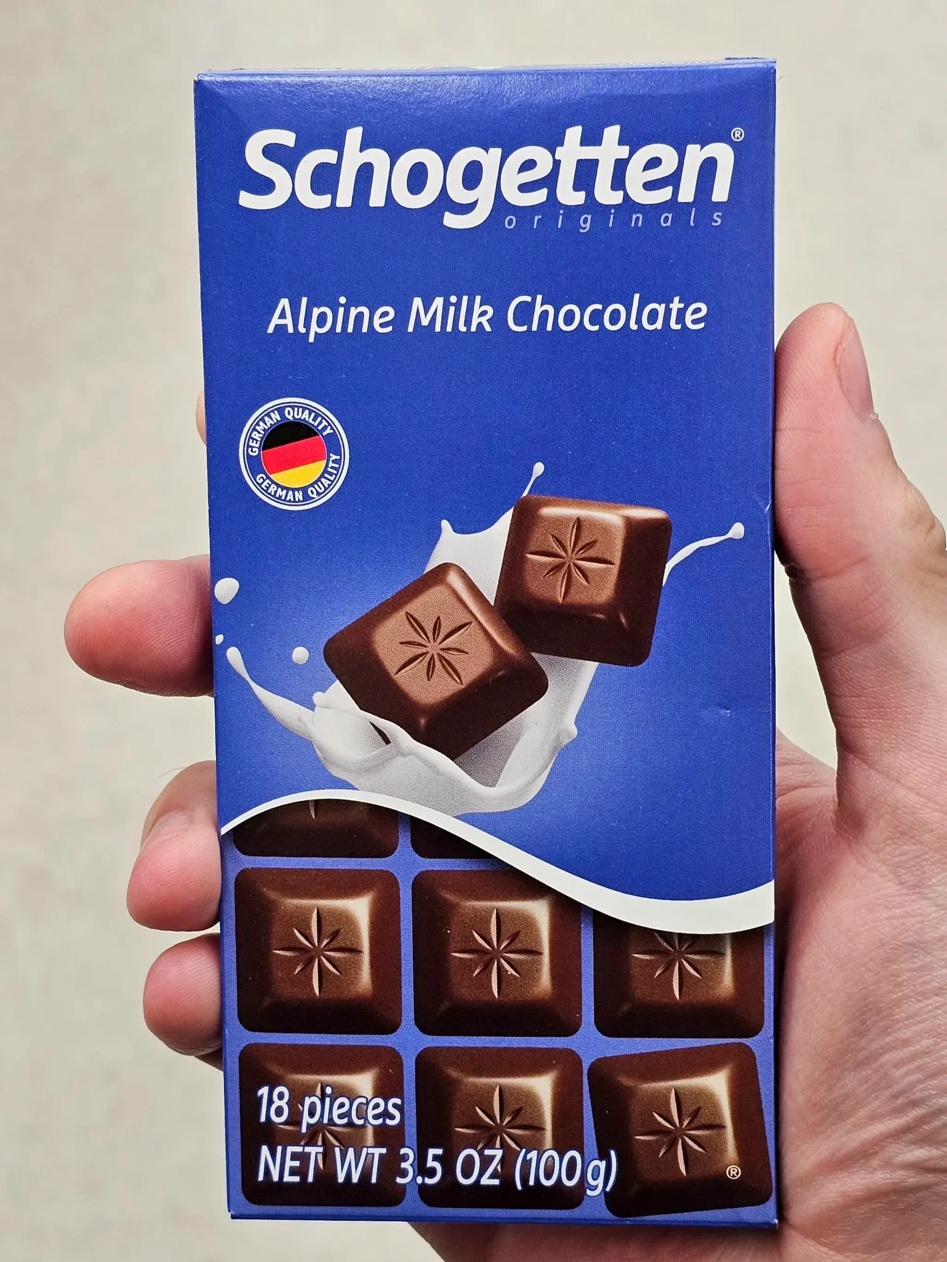 Front package of Schogetten Alpine Milk Chocolate bar.