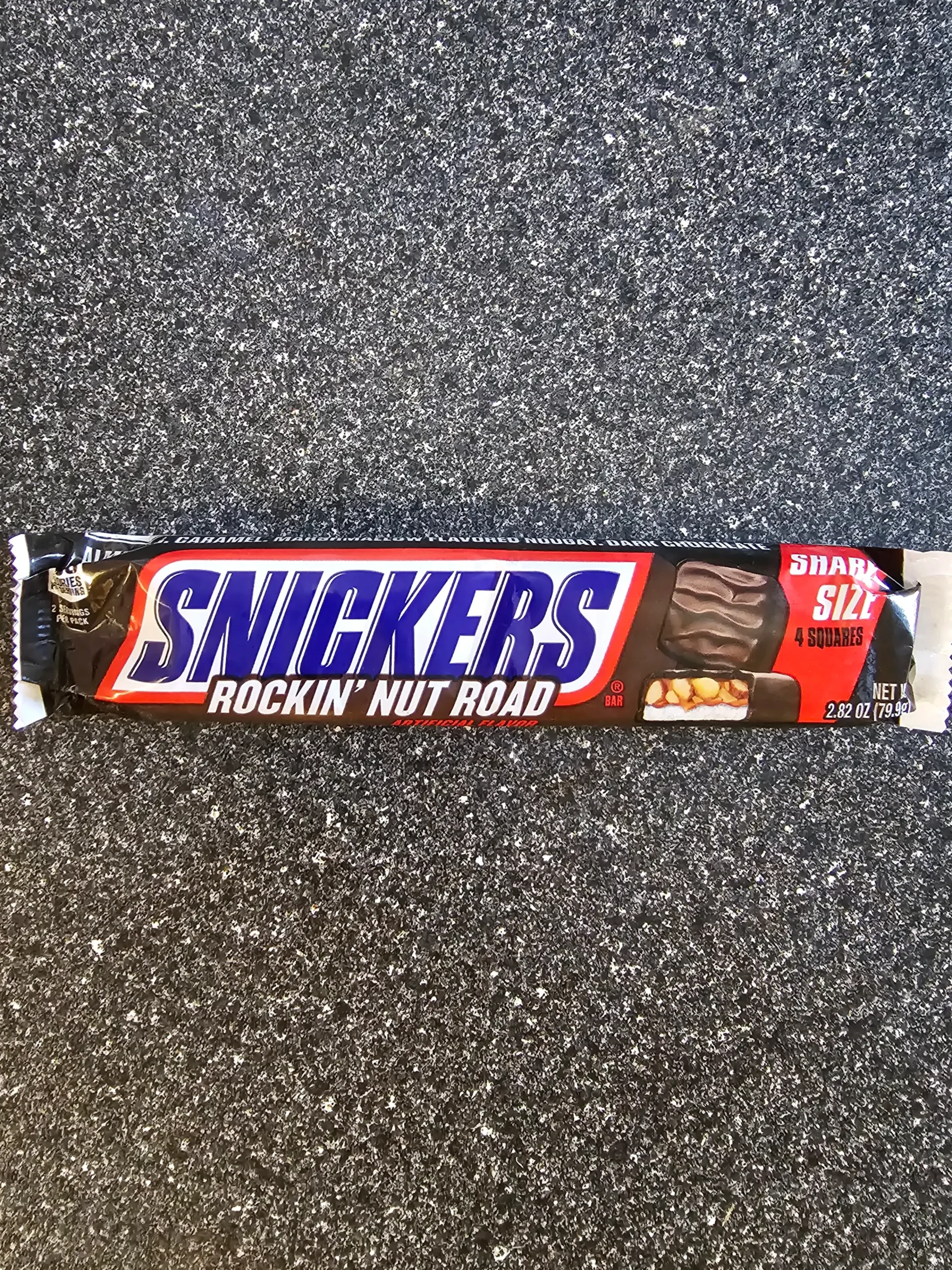 Front package of Snickers Rockin' Nut Road candy bar.