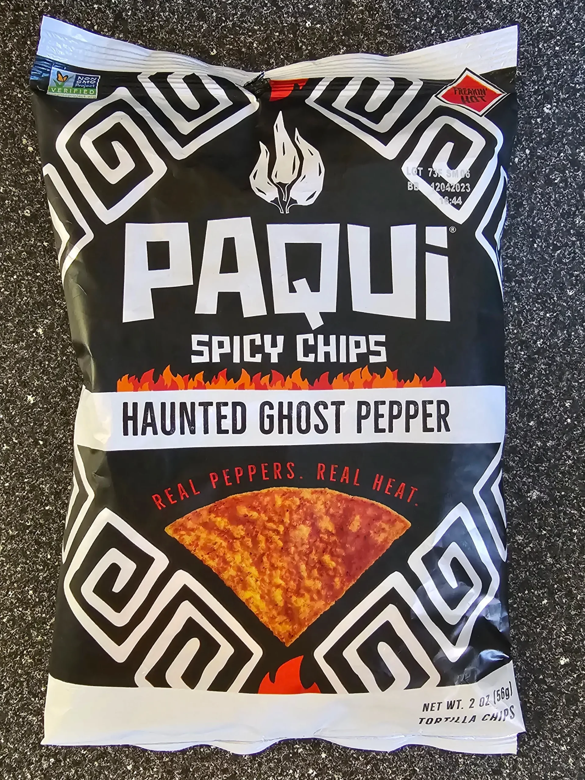 Front package of Paqui Haunted Ghost Pepper Spicy Chips.