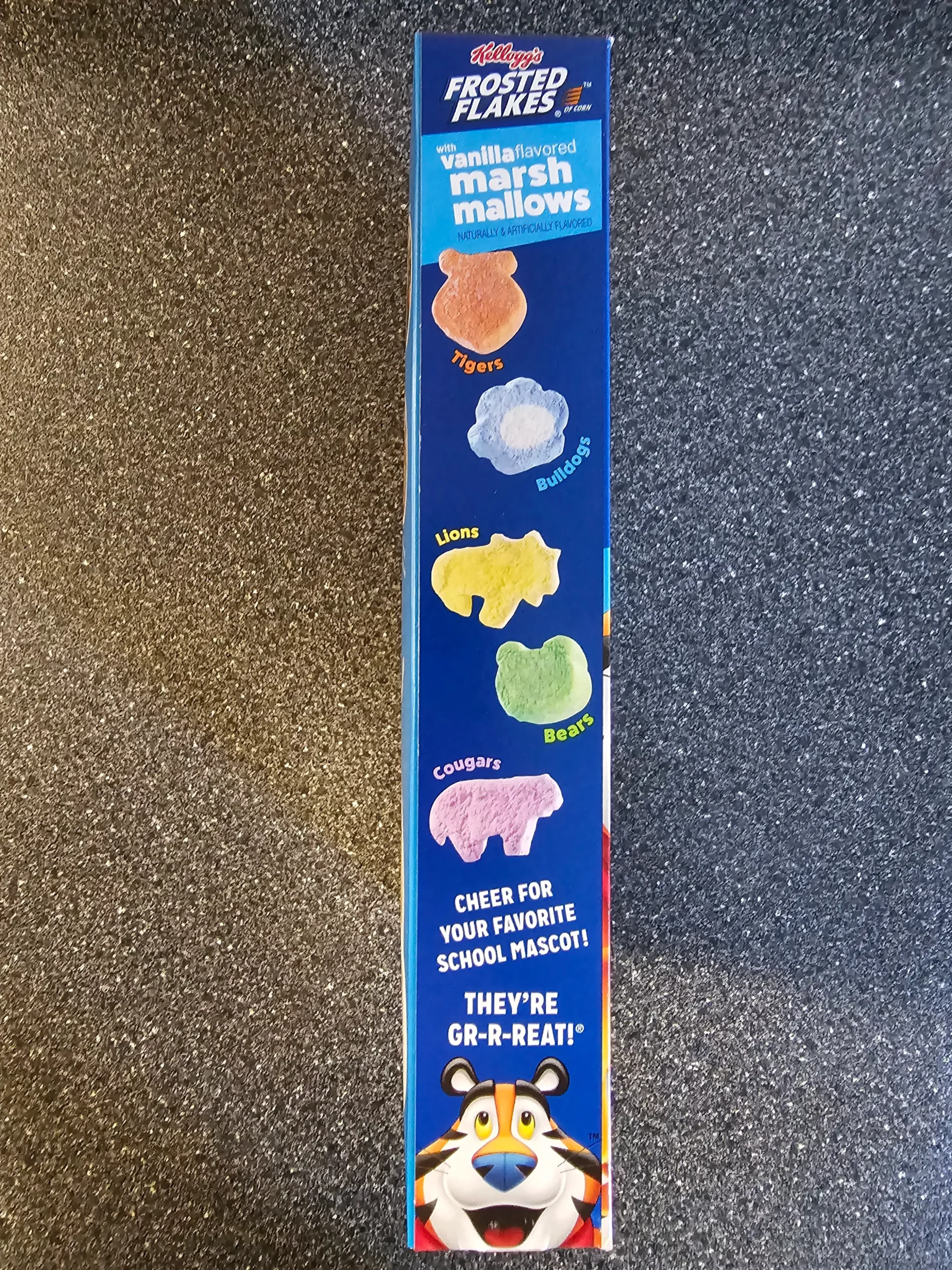 Side box of Frosted Flakes with Vanilla Marshmallows that shows list of marshmallows inside.
