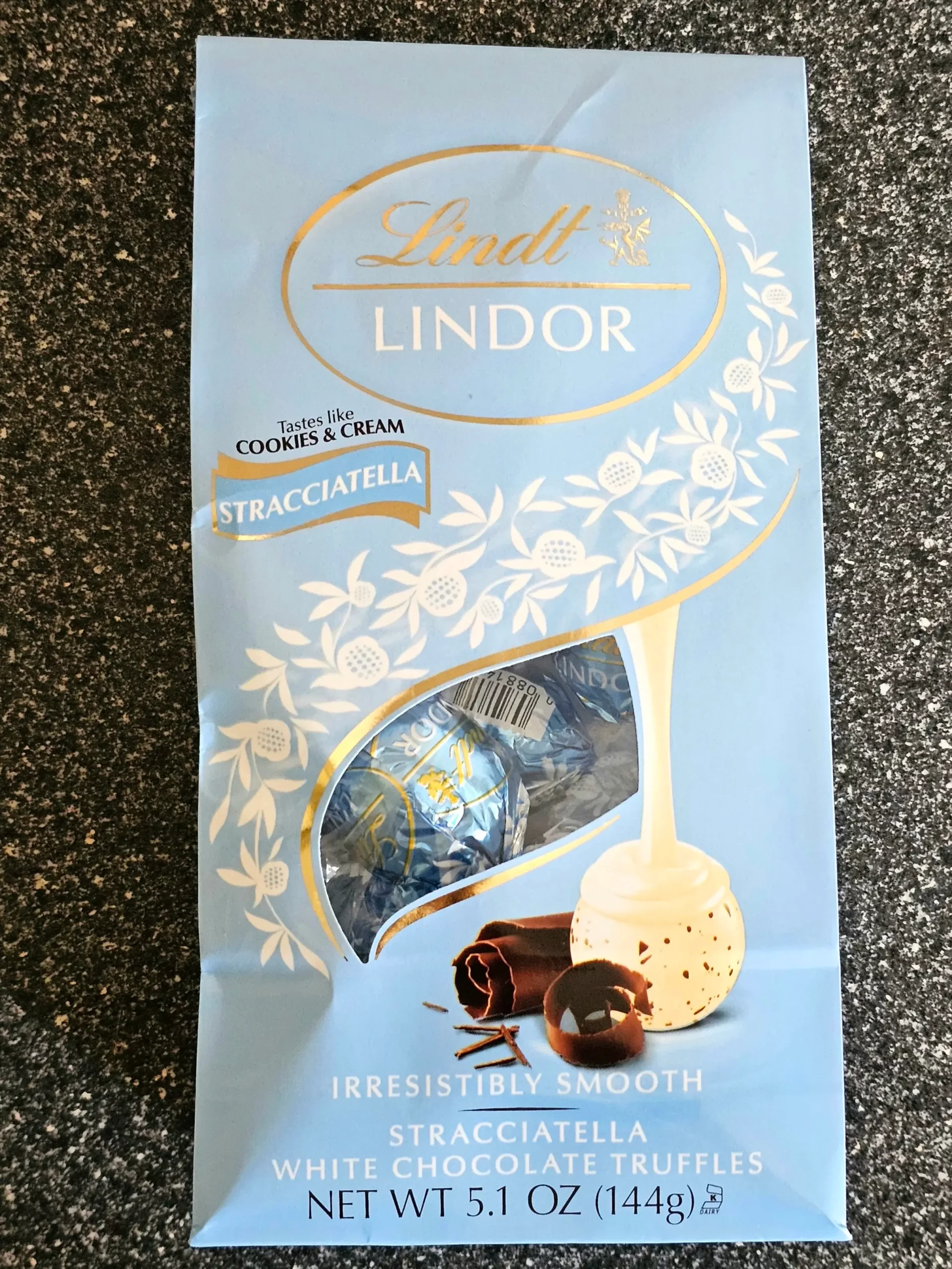 Front package of Lindt White Chocolate Stracciatella truffles.