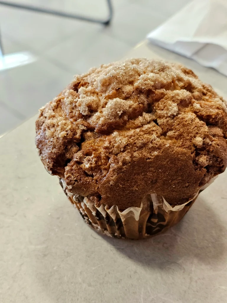 Dunkin' Donuts Coffee Cake Muffin on a table.