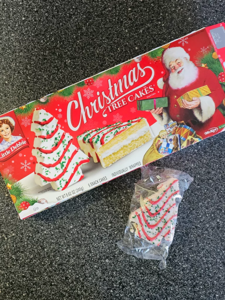 Front box and package of Little Debbie Christmas Tree Cakes.