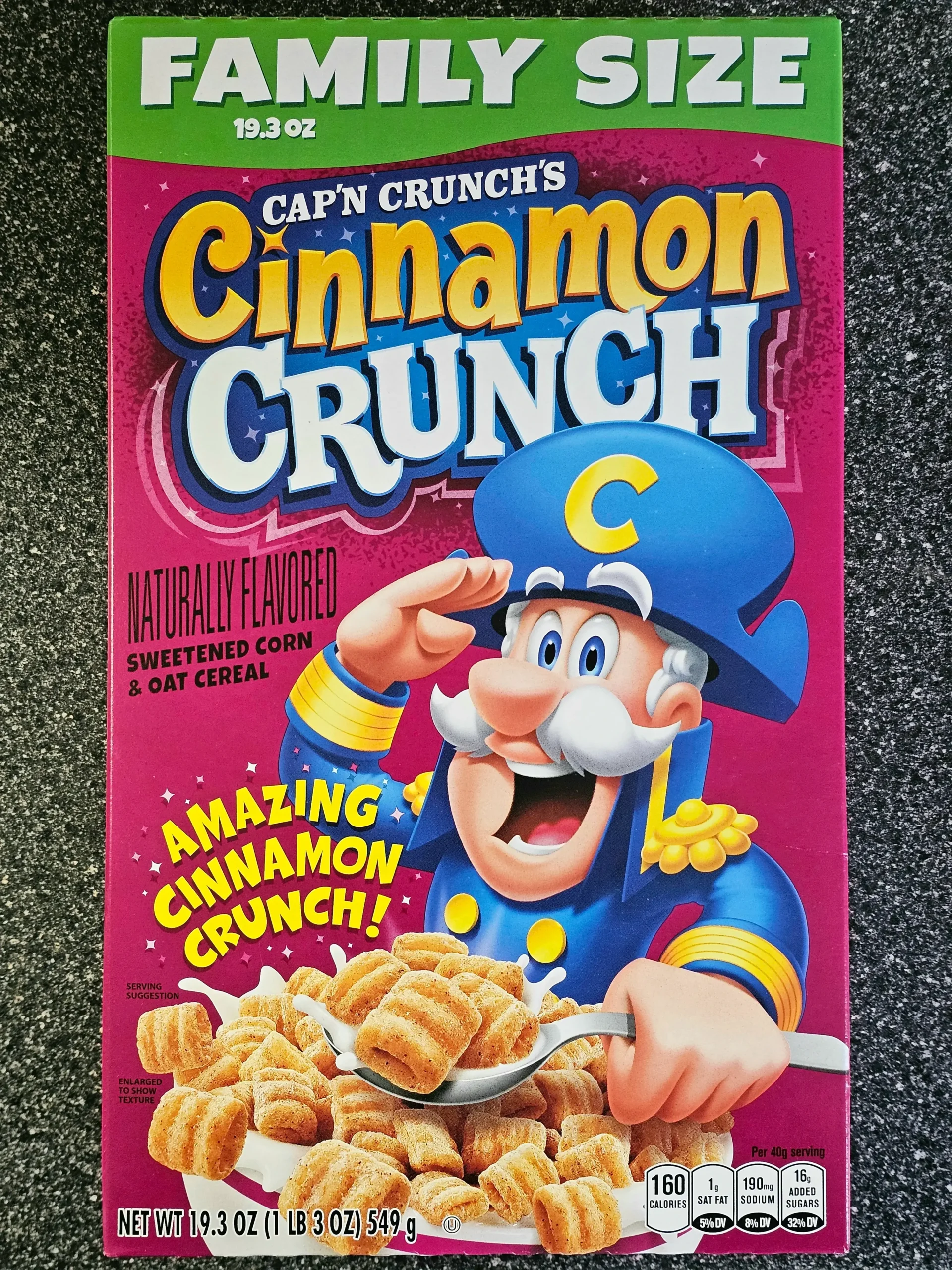 Front box of Cap'n Crunch Cinnamon Crunch cereal.