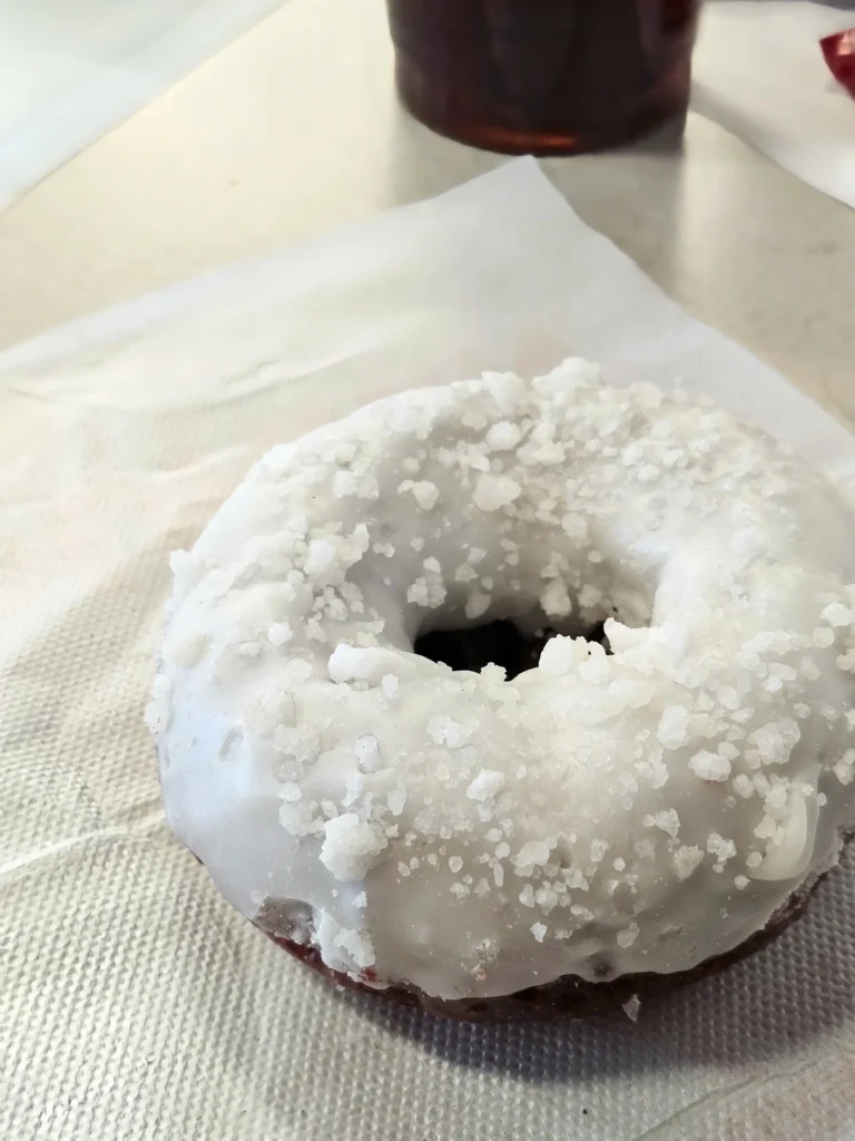 Dunkin Donuts 2023 Red Velvet Donut on a table.