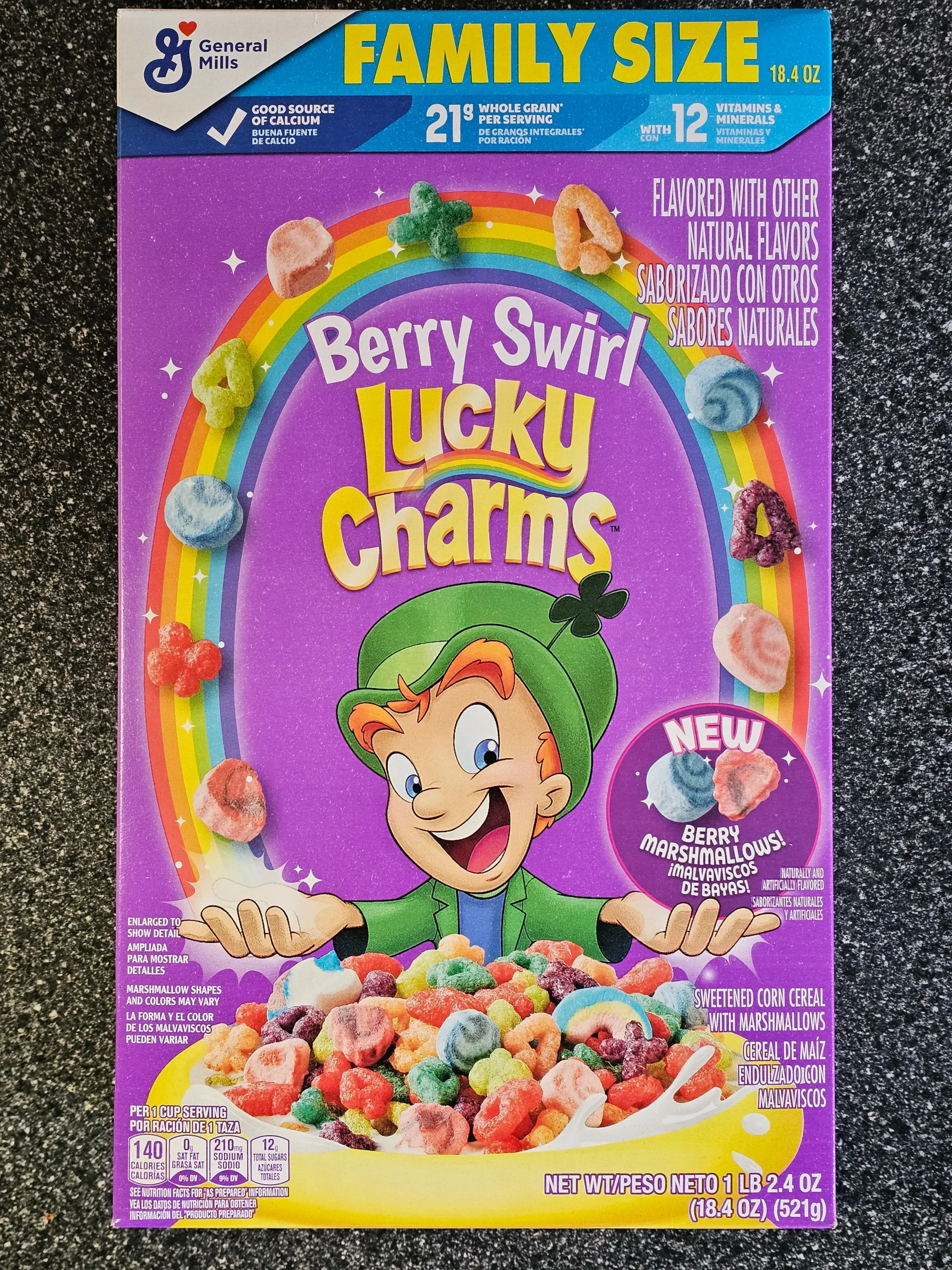 Front box of Berry Swirl Lucky Charms cereal box.