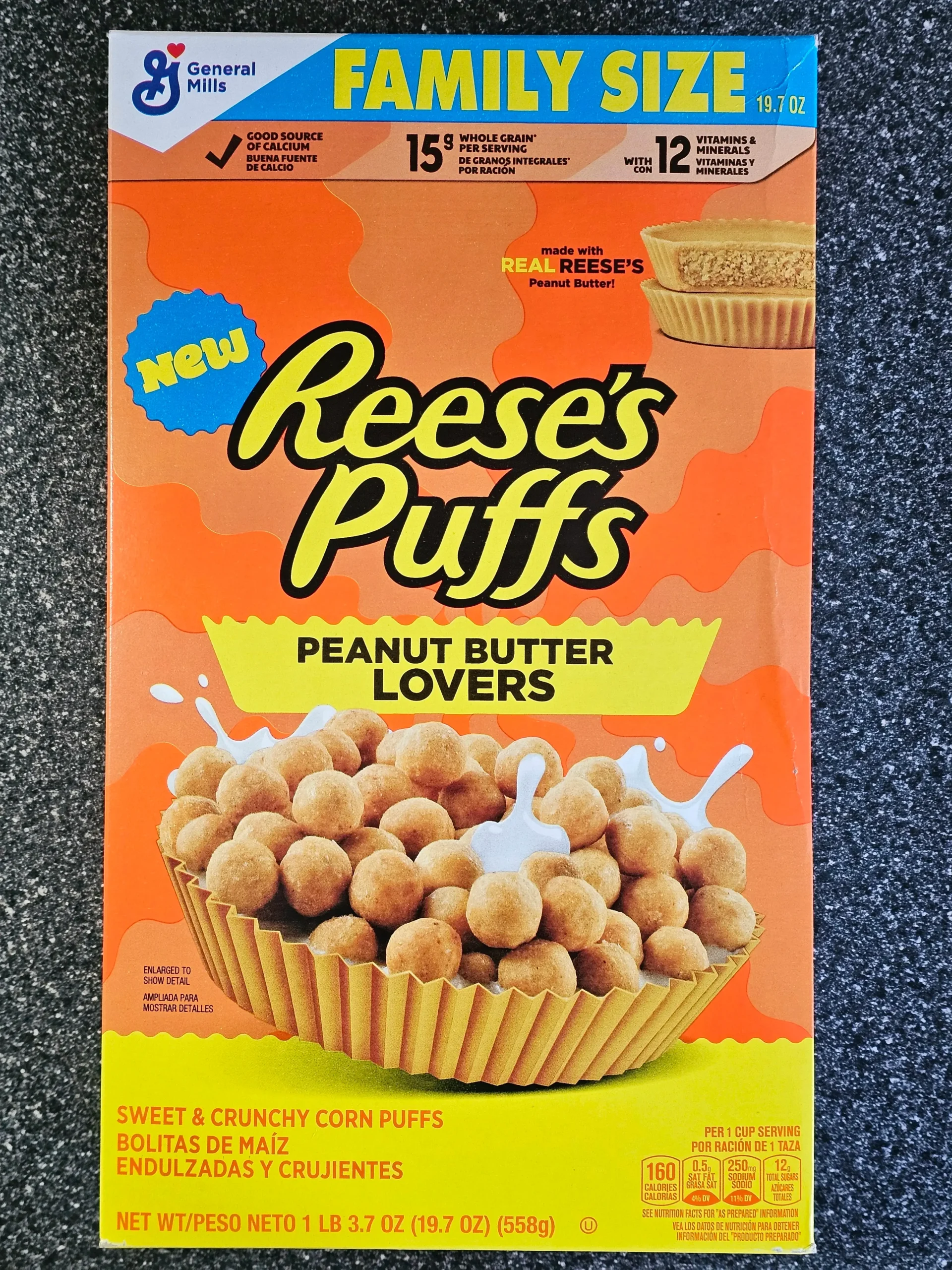 Front box of Reese's Puffs Peanut Butter Lovers cereal box.