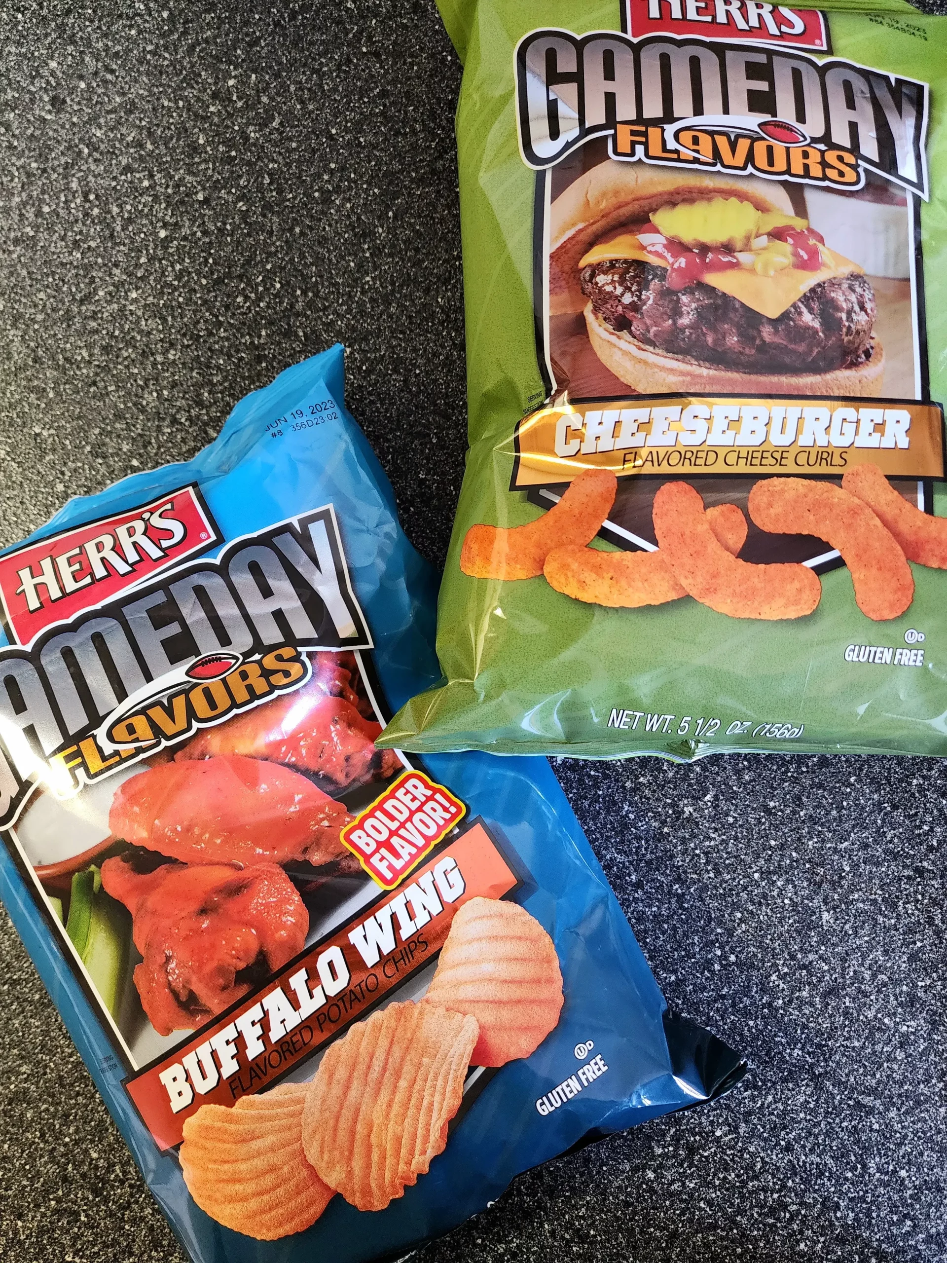 Herr's Gameday Buffalo Wing Chips & Cheeseburger Cheese Curls.