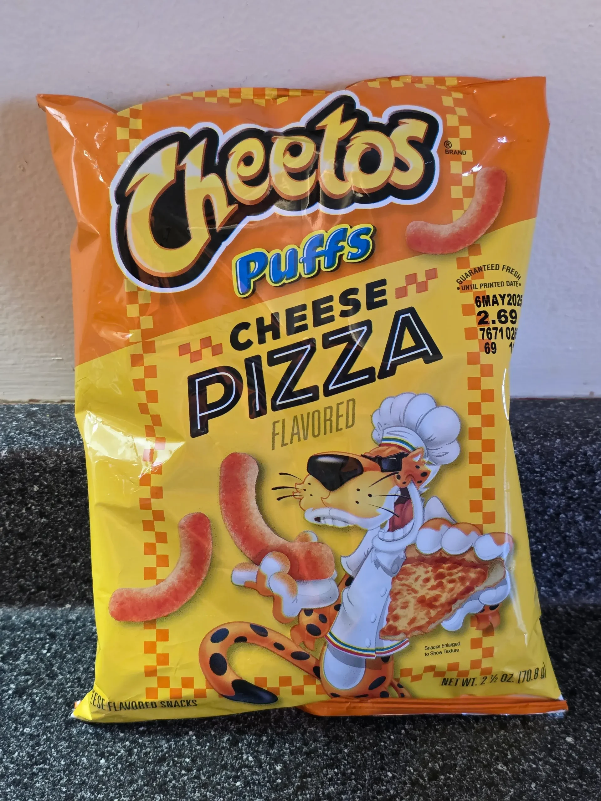 Cheetos Puffs Cheese Pizza Flavored.