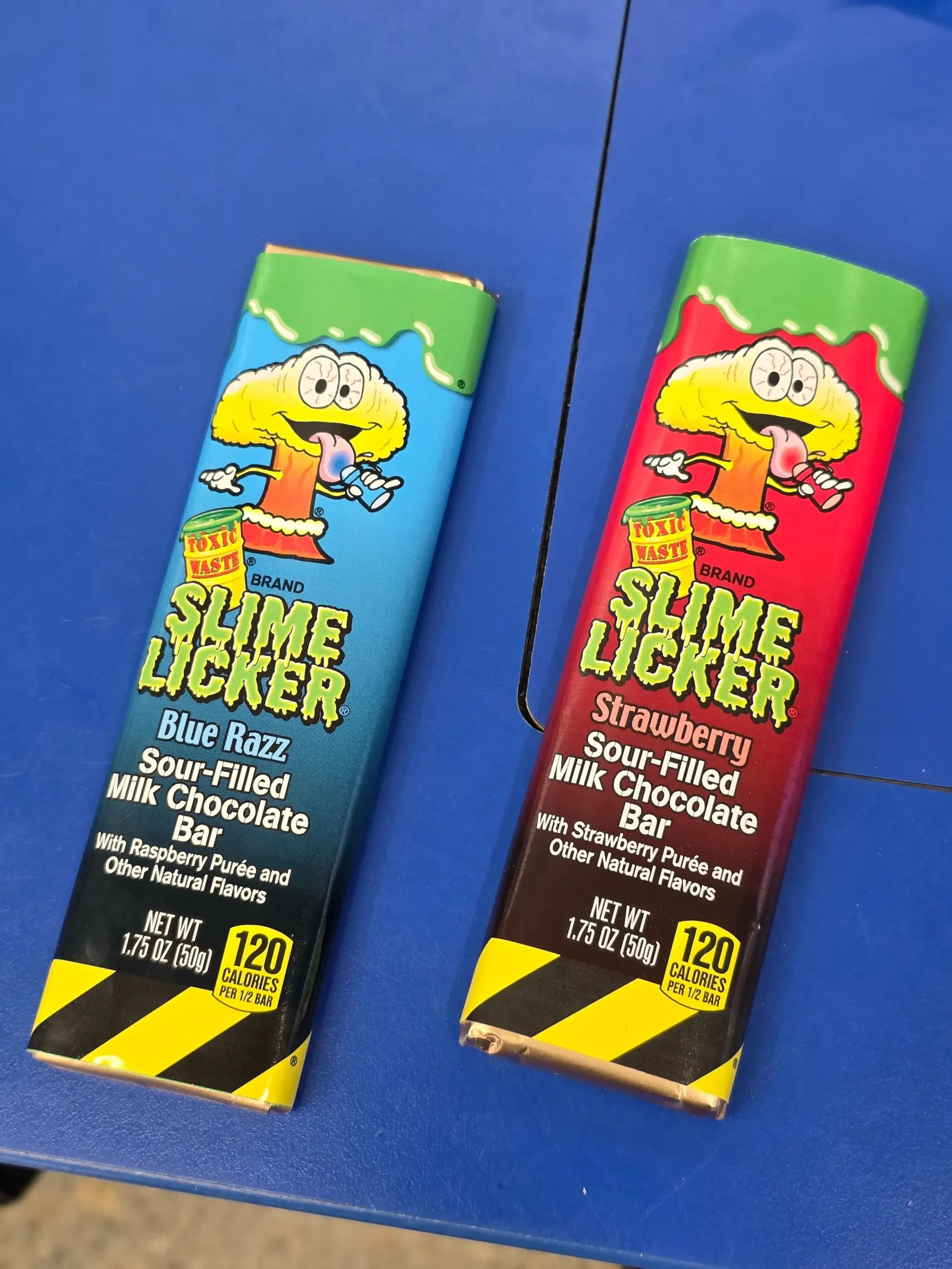 Toxic Waste Slime Licker Sour-Filled Milk Chocolate Bar, Blue Razz and Strawberry.