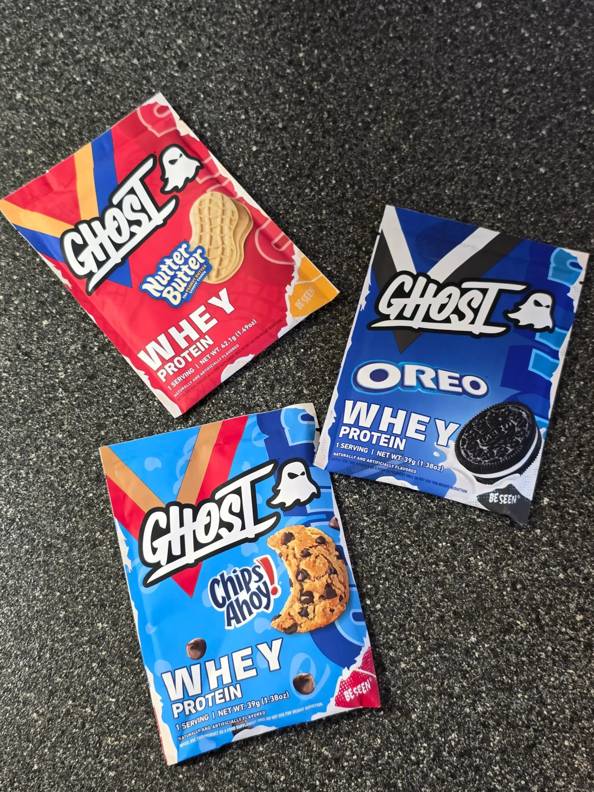 Ghost Whey Protein: Nutter Butter, Chips Ahoy!, and Oreo.