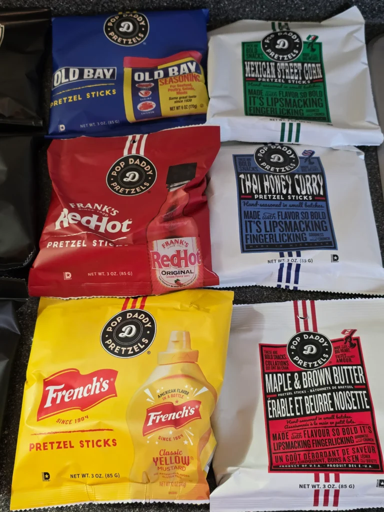 pop daddy pretzel sampler pack: Strawberry Shortcake, French’s, Frank’s RedHot, Old Bay, Maple & Brown Butter, Thai Curry Honey, Birthday Cake, Beer Cheese, Dill Pickle, Smoked Gouda, Cinnamon Sugar, Peppercorn Ranch, Garlic Parmesan, Mexican Street Corn.