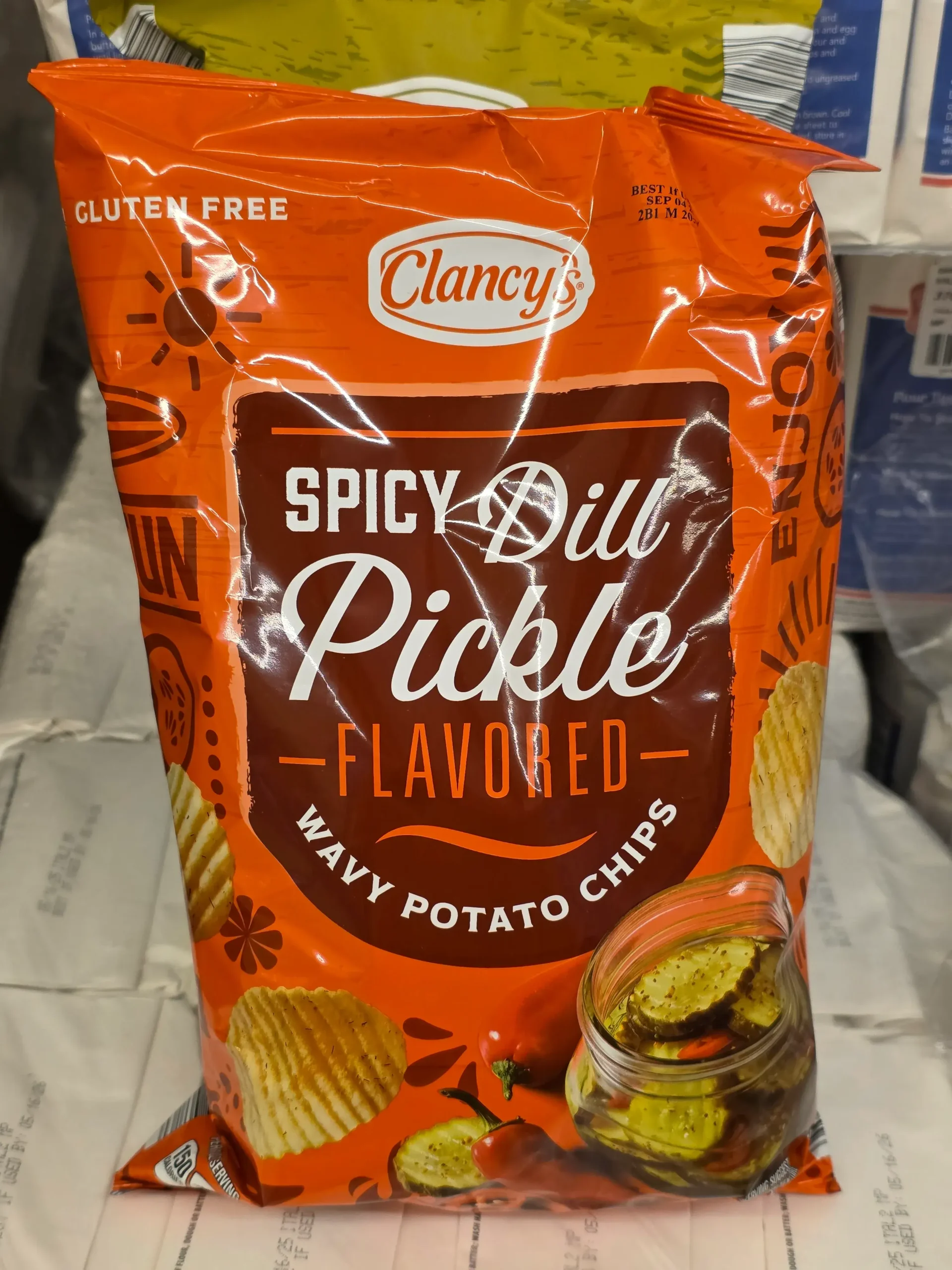 Clancy's Spicy Dill Pickle Flavored Wavy Potato Chips.