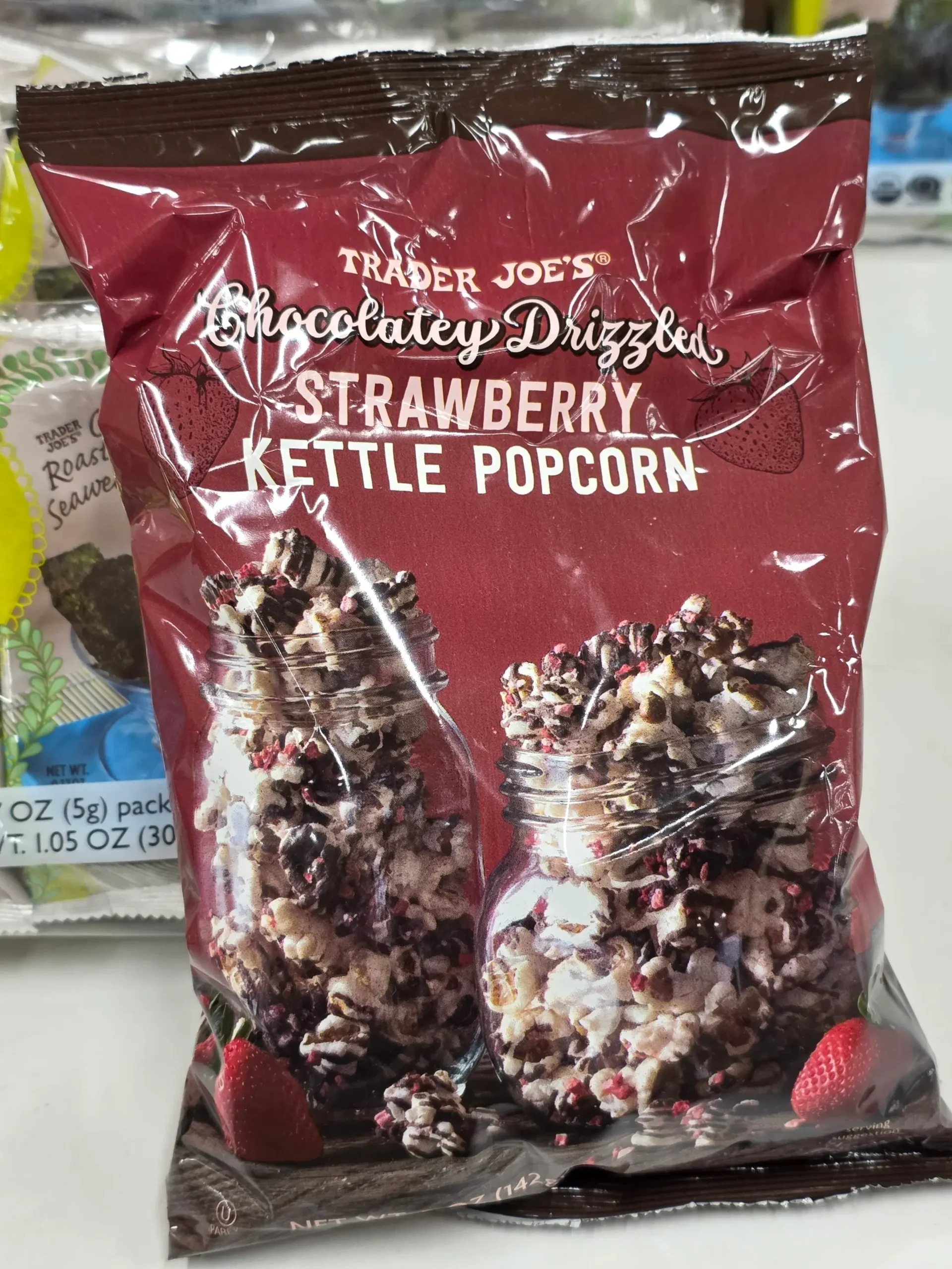 Trader Joe's Chocolatey Drizzled Strawberry Kettle Popcorn.