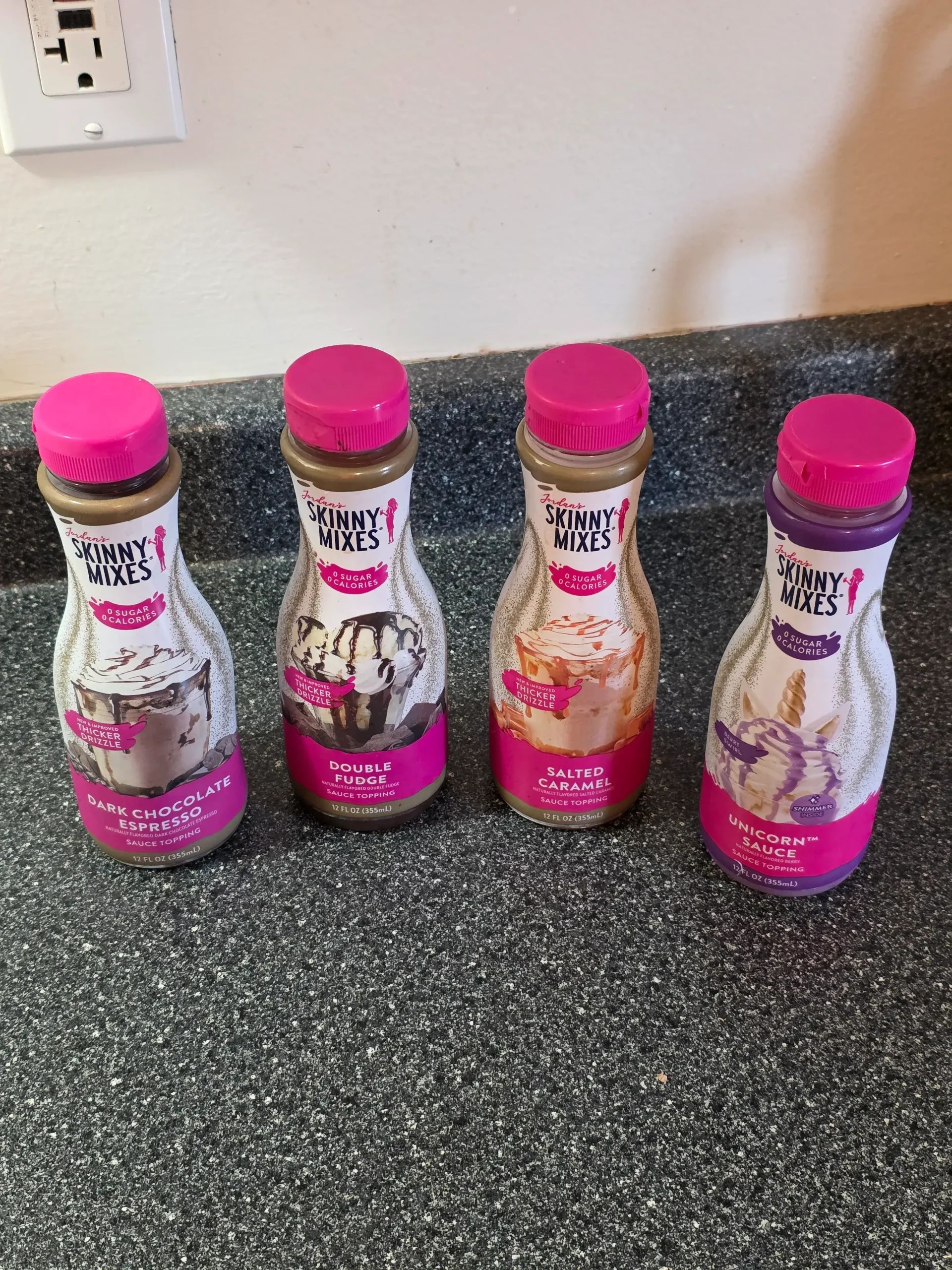 Jordan's Skinny Mixes Sauce Topping: Dark Chocolate Espresso, Double Fudge, Salted Caramel, and Unicorn Sauce.