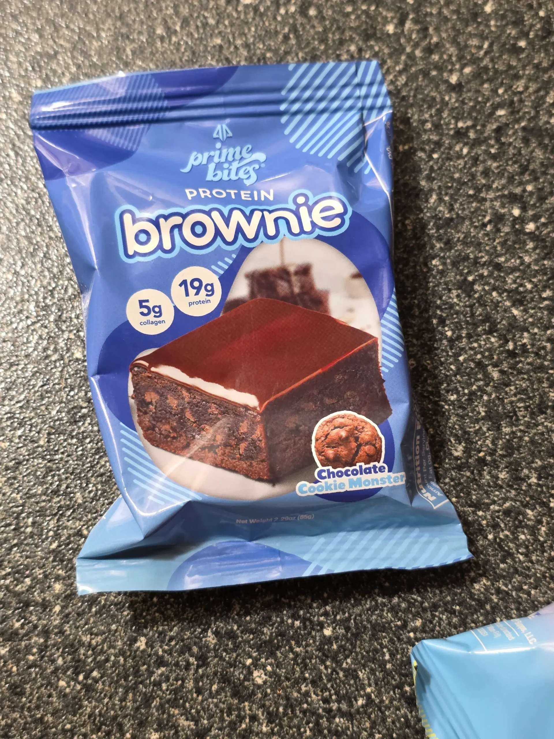 Prime Bites variety pack, including: Chocolate Glazed Donut, Glazed Cinnamon Roll, Birthday Cake, Banana Nut, Peanut Butter Candy Crunch, Chocolate Cookie Monster, Cookie Dough, Blueberry Cobbler, and Cookies & Cream Blondie.
