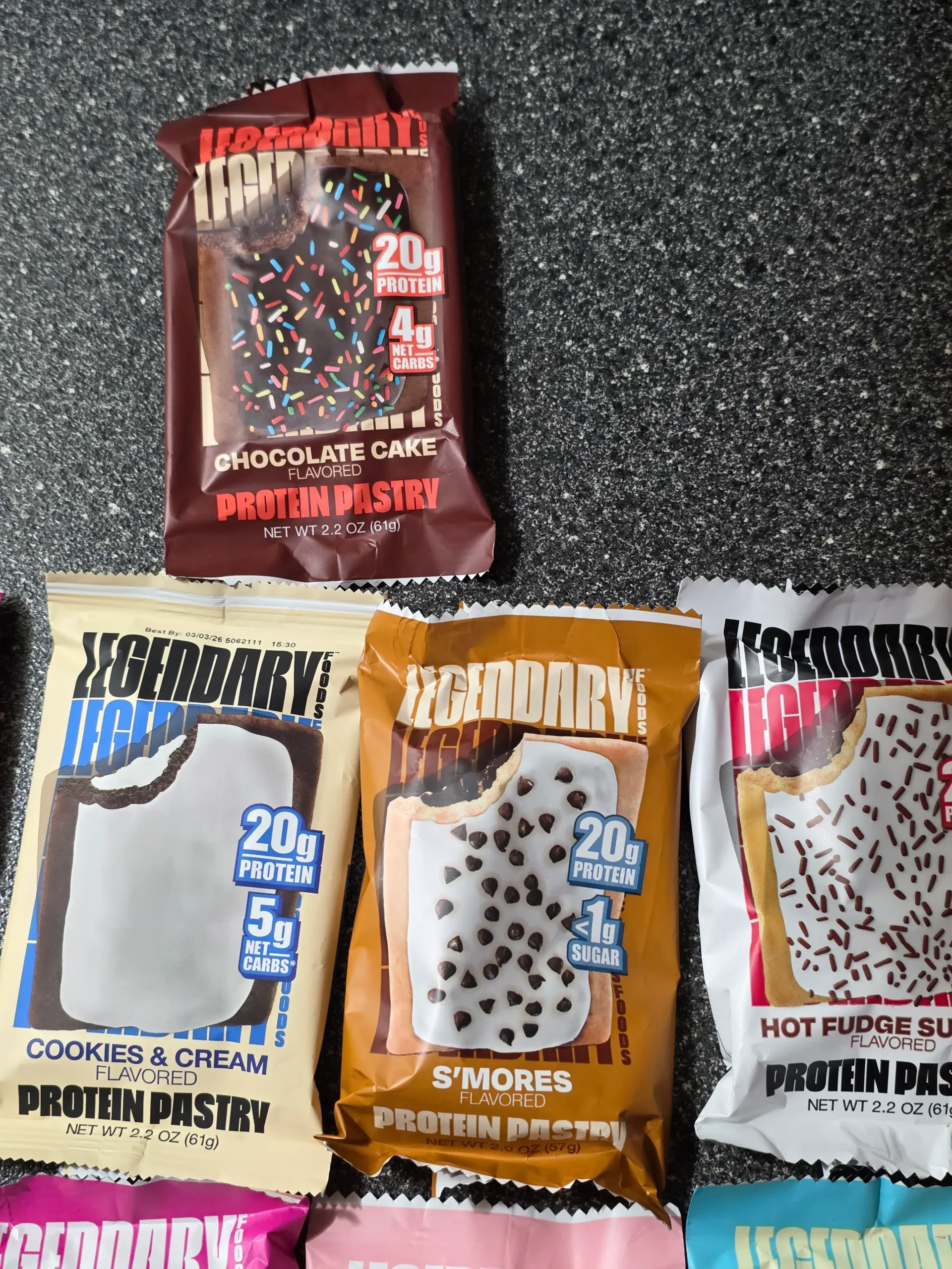 Legendary Foods Cake Style Protein Pastry "Pop-Tarts": Chocolate Cake, Cherry Crumble, Cookies & Cream, S'mores, Hot Fudge Sundae, Blueberry, Birthday Cake, Strawberry, and Brown Sugar Cinnamon.