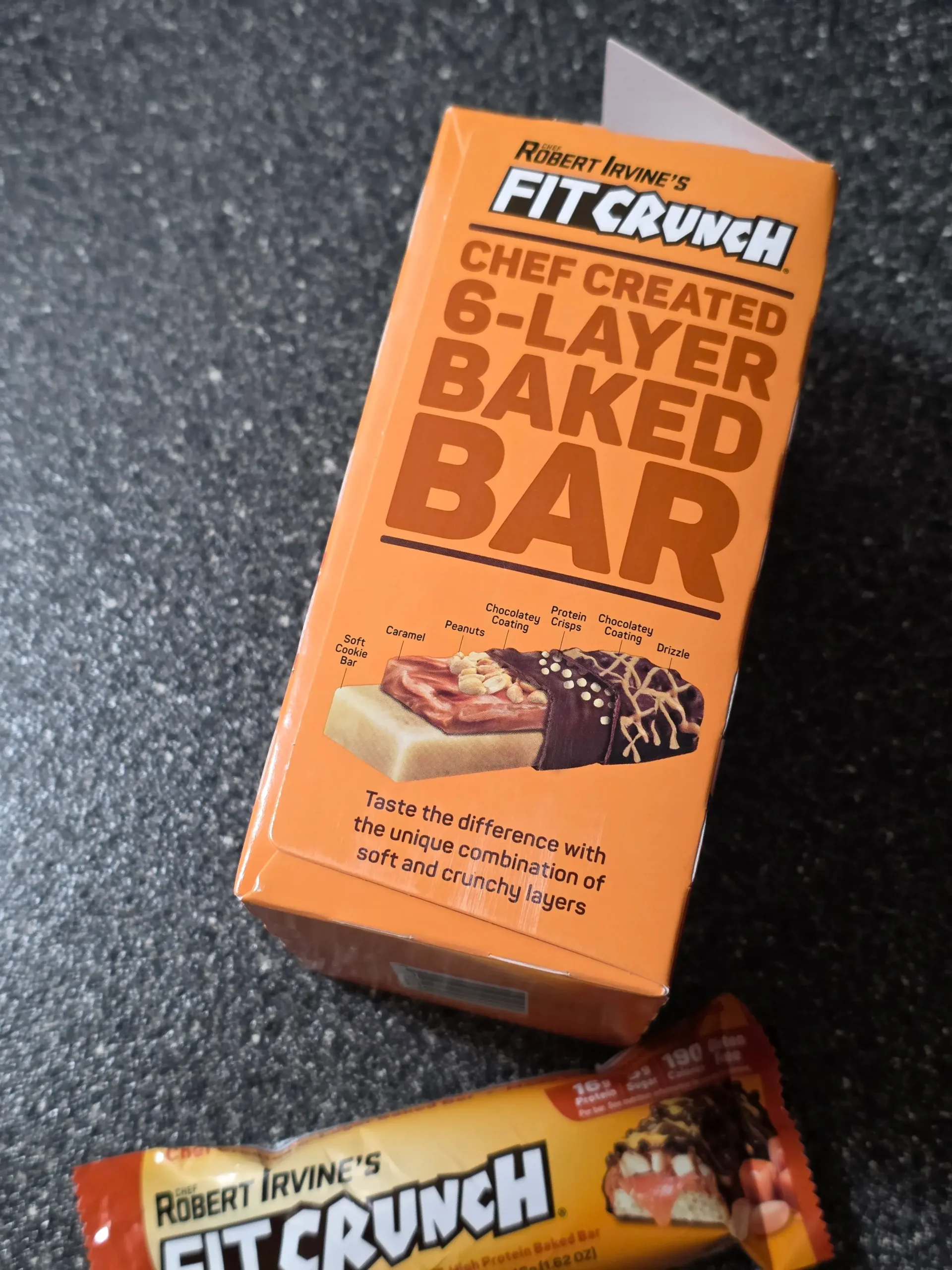 Robert Irvine's FITCRUNCH Caramel Peanut Protein Bar. 