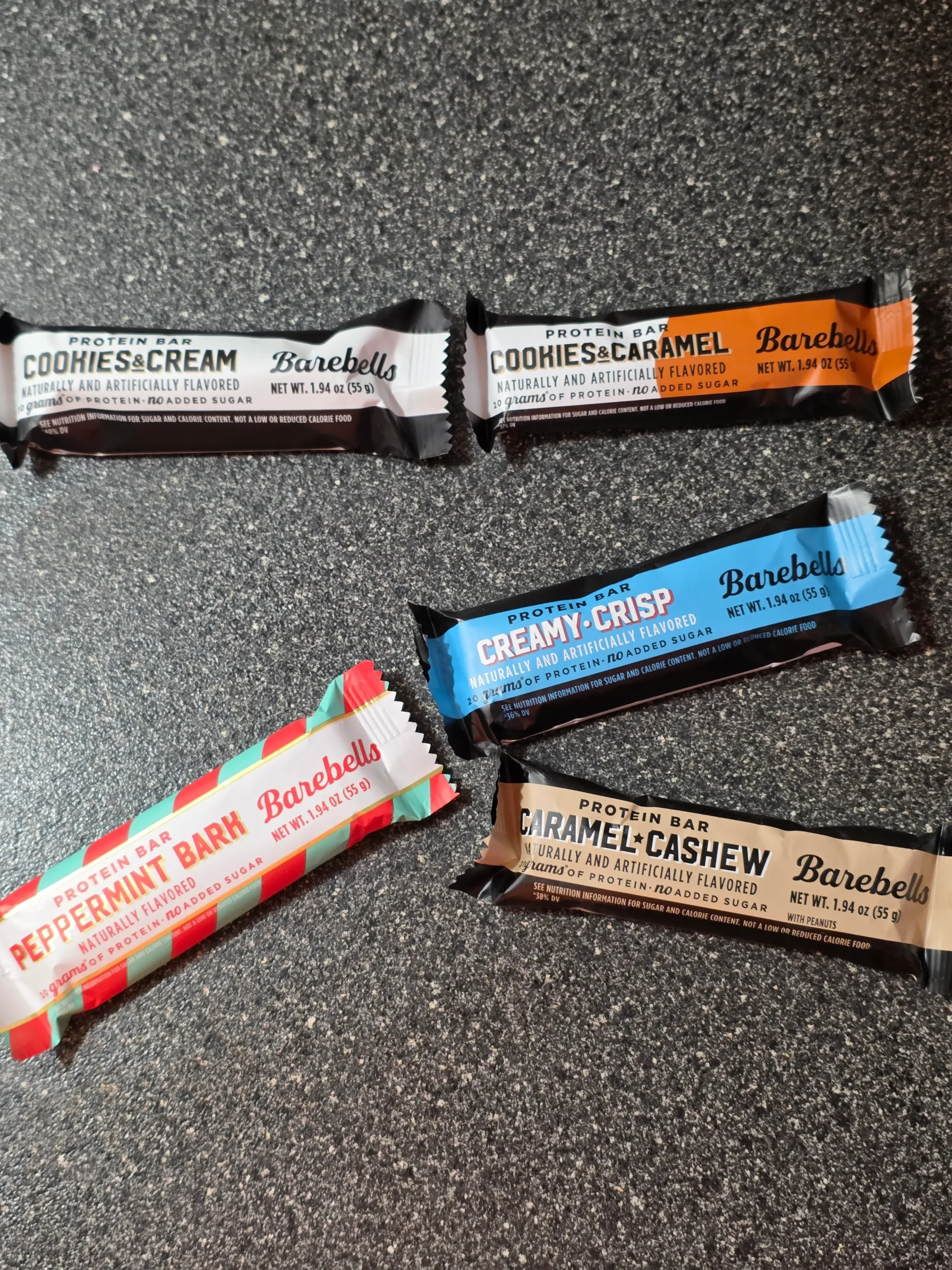 Barebells Protein Bars: Cookies & Cream, Peppermint Bark, Cookies & Caramel, Creamy Crisp, and Caramel Cashew.