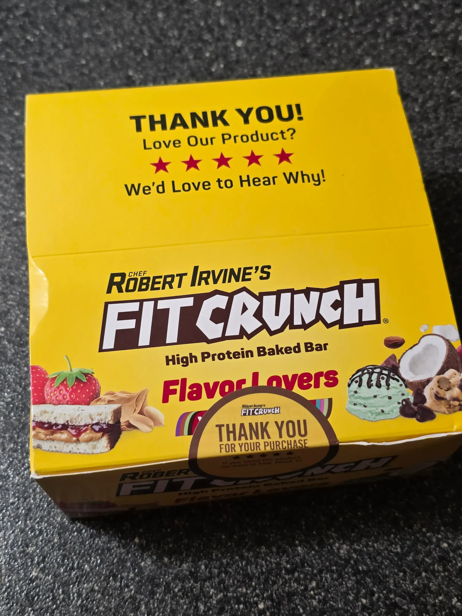 Robert Irvine's FITCRUNCH Protein Bars, including Flavor Lover's Variety pack: Chocolate Peanut Butter, Chocolate Banana, Chocolate Chip Cookie Dough, Chocolate Brownie, Chocolate Coconut Almond, Cinnamon Twist, Milk & Cookies, Lemon Cake, Apple Pie, and Mint Madness Loaded Cookie.