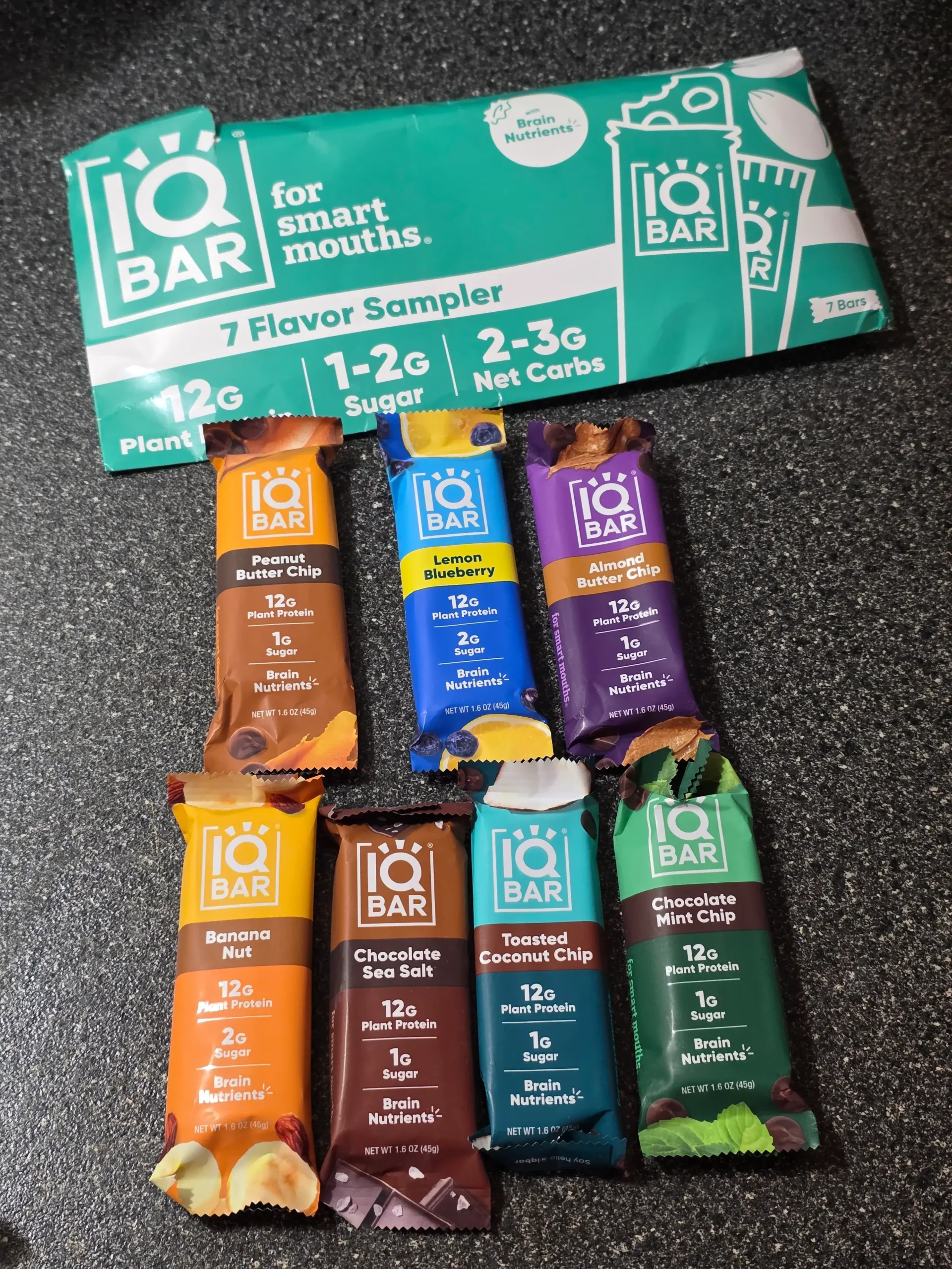 IQBAR Protein Bars Sampler Pack: Almond Butter Chip, Lemon Blueberry, Peanut Butter Chip, Chocolate Mint Chip, Toasted Coconut Chip, Chocolate Sea Salt, and Banana Nut.