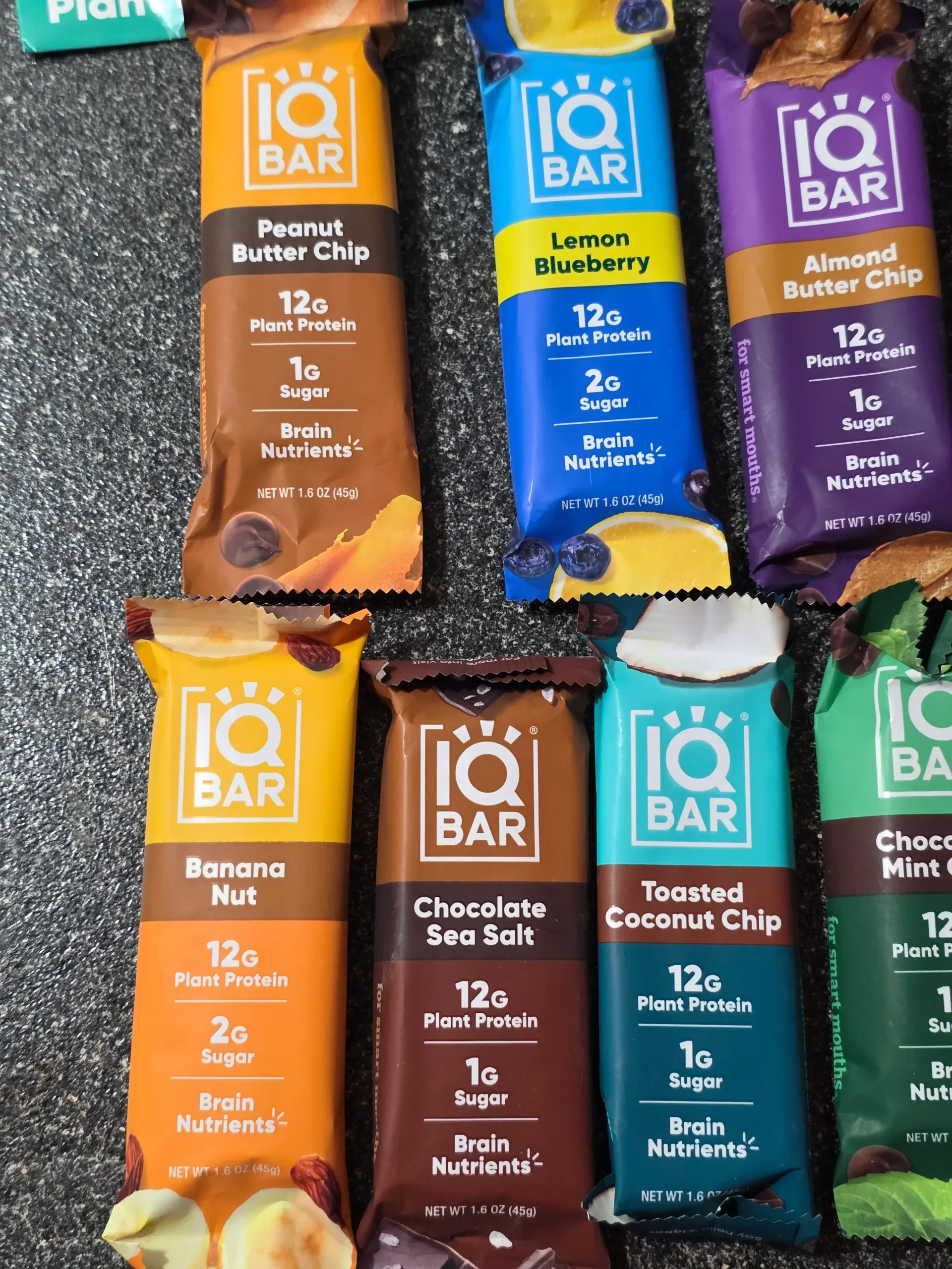 IQBAR Protein Bars Sampler Pack: Almond Butter Chip, Lemon Blueberry, Peanut Butter Chip, Chocolate Mint Chip, Toasted Coconut Chip, Chocolate Sea Salt, and Banana Nut.