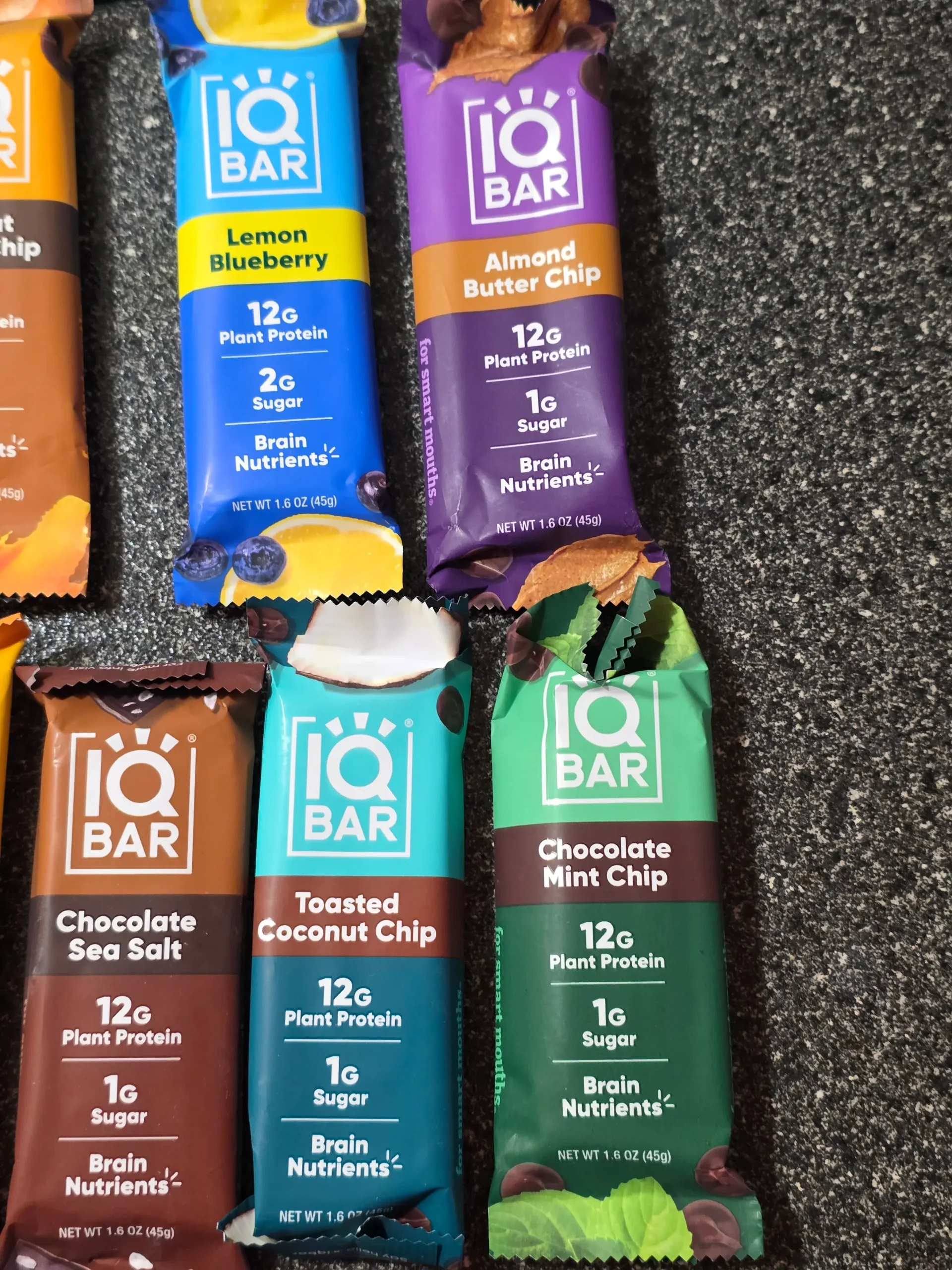 IQBAR Protein Bars Sampler Pack: Almond Butter Chip, Lemon Blueberry, Peanut Butter Chip, Chocolate Mint Chip, Toasted Coconut Chip, Chocolate Sea Salt, and Banana Nut.
