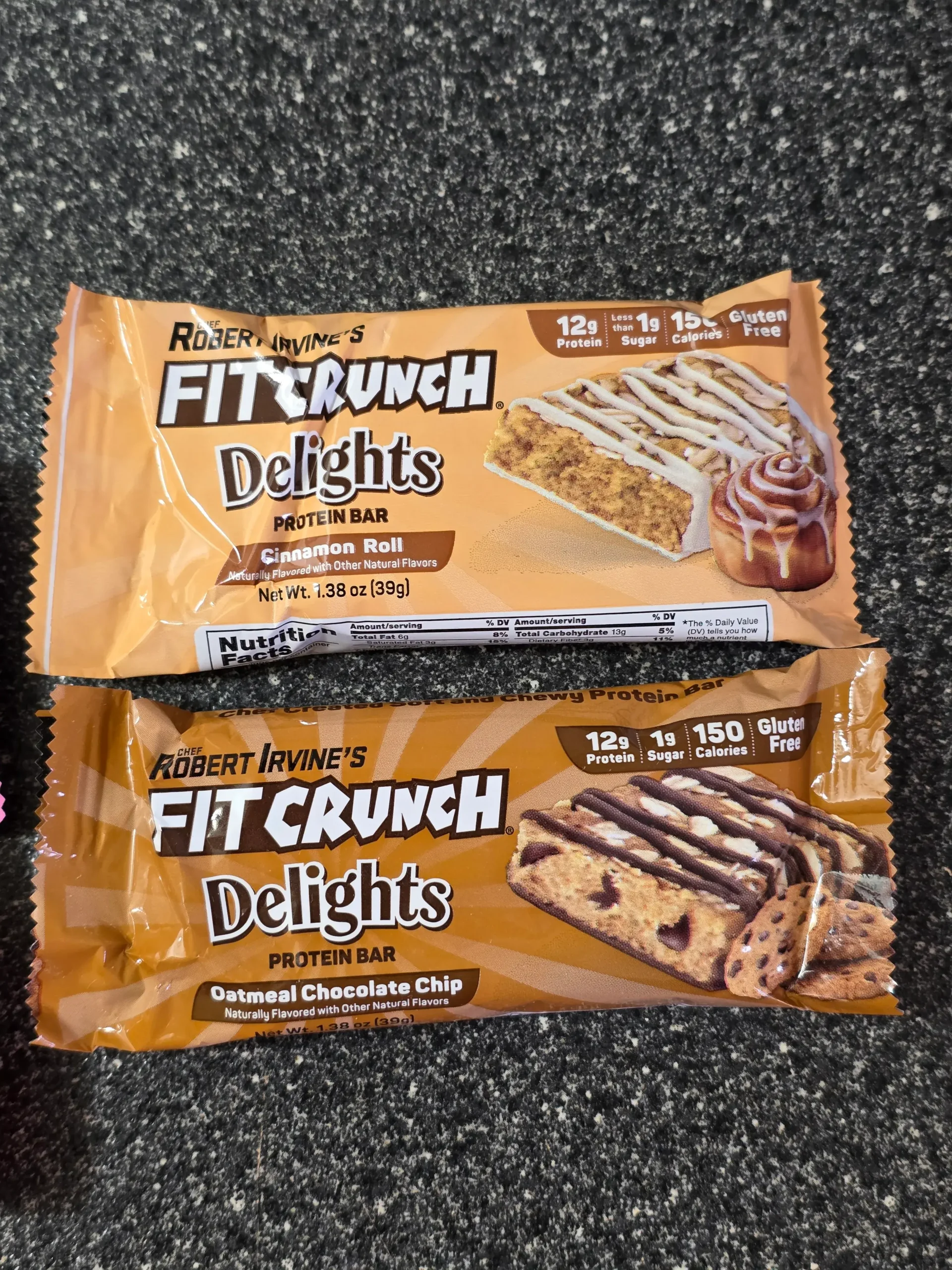 FITCRUNCH Delights: Cinnamon Roll, Oatmeal Chocolate Chip, Pumpkin Spice Muffin and Strawberry Muffin.